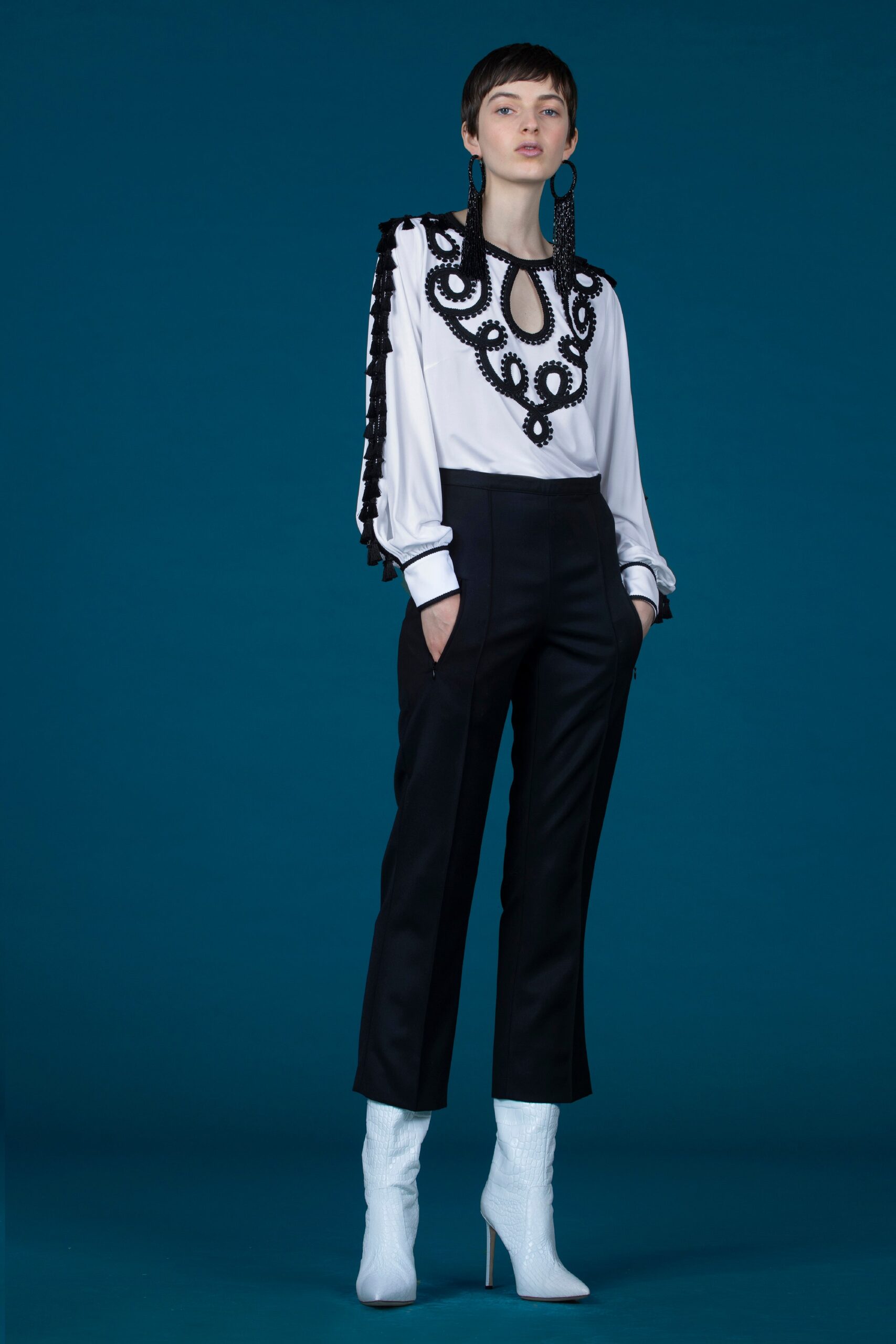 white embroidered blouse black pants