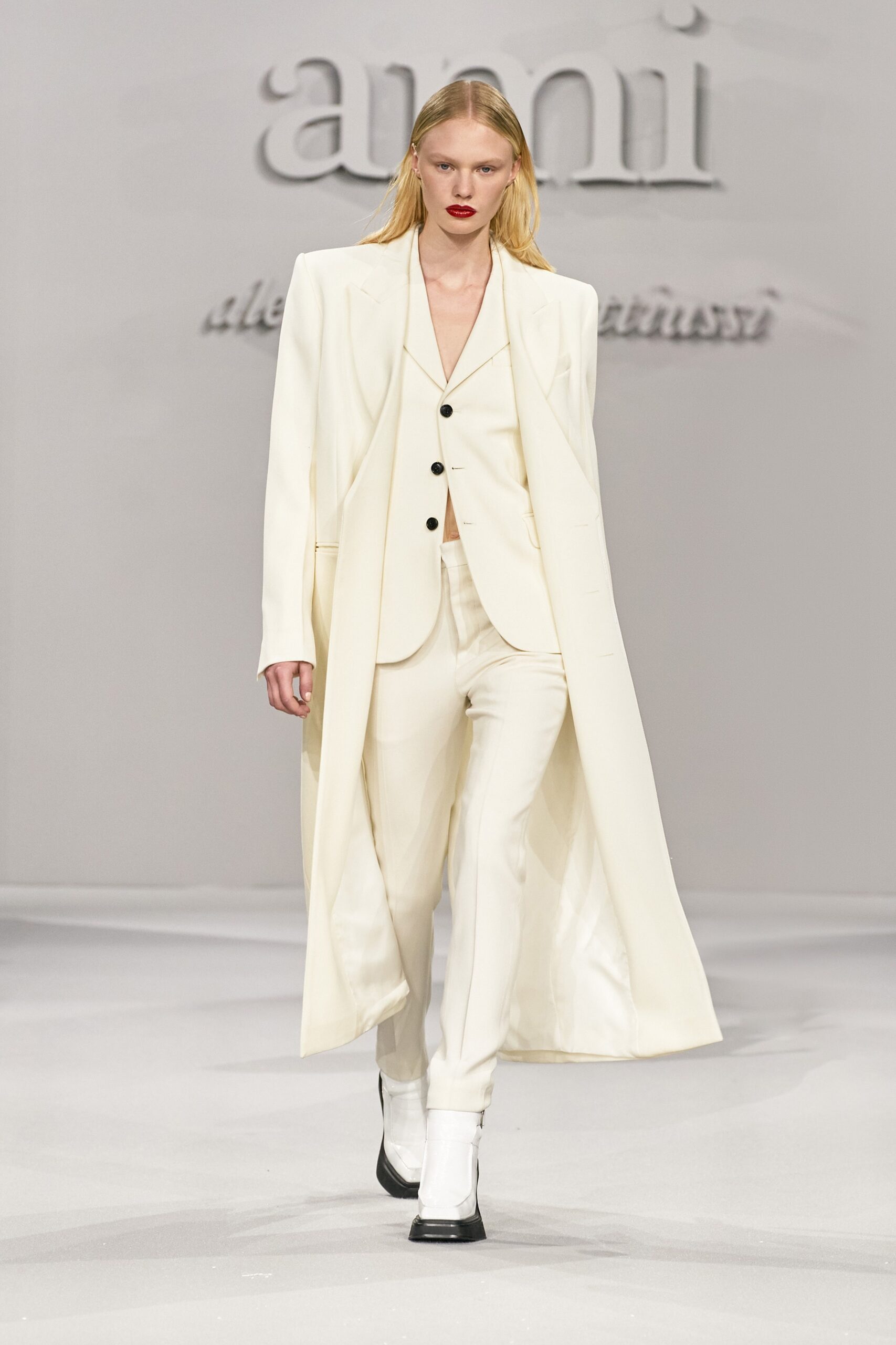 white tailored trench suit