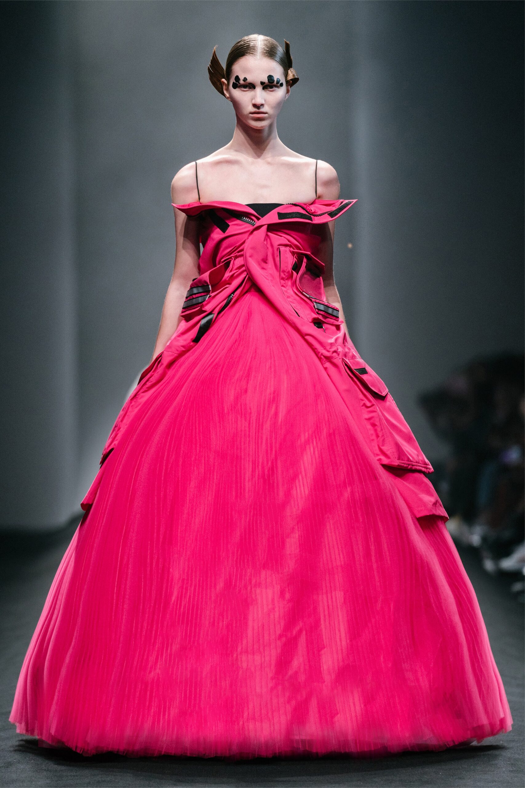 pink pleated off-shoulder gown