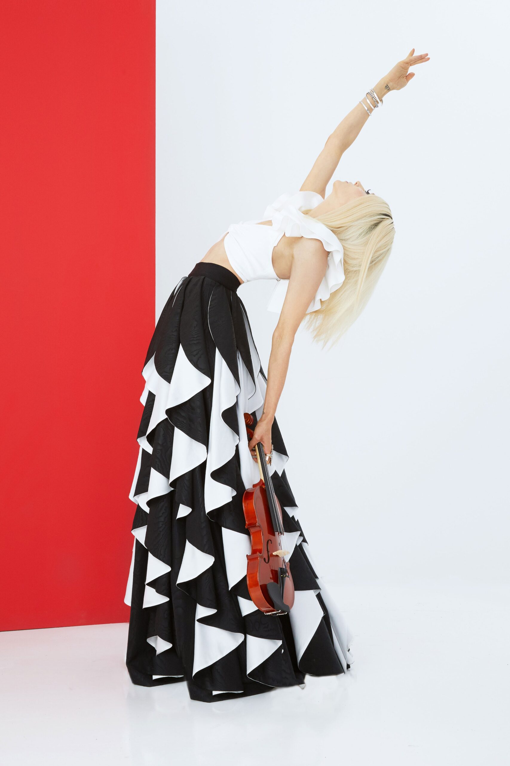 white ruffled top and tiered skirt