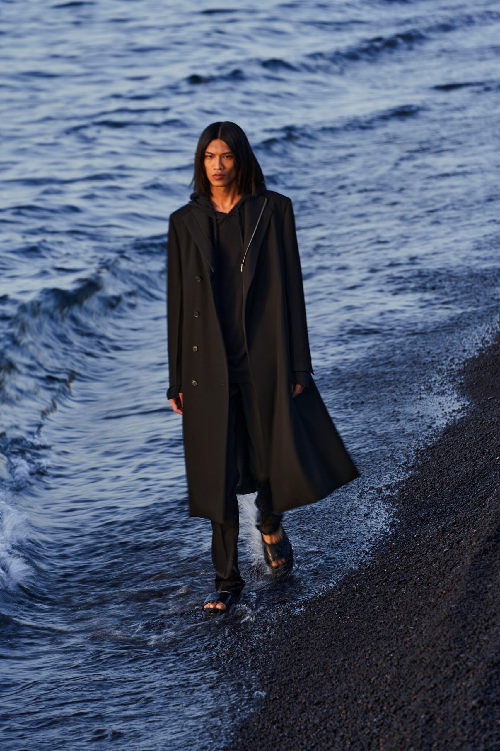 black relaxed coat with slim pants