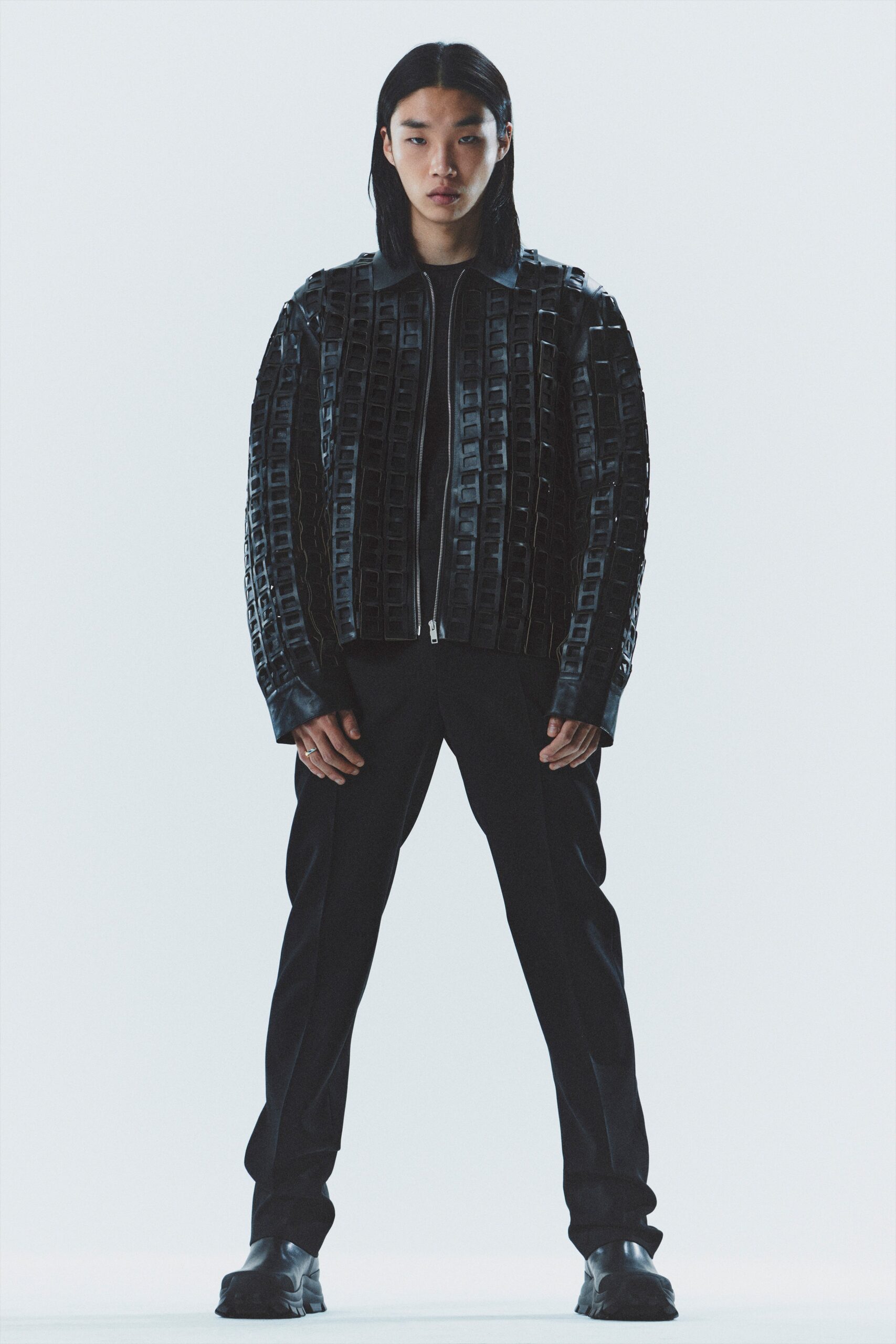 black leather fitted jacket and slim pants