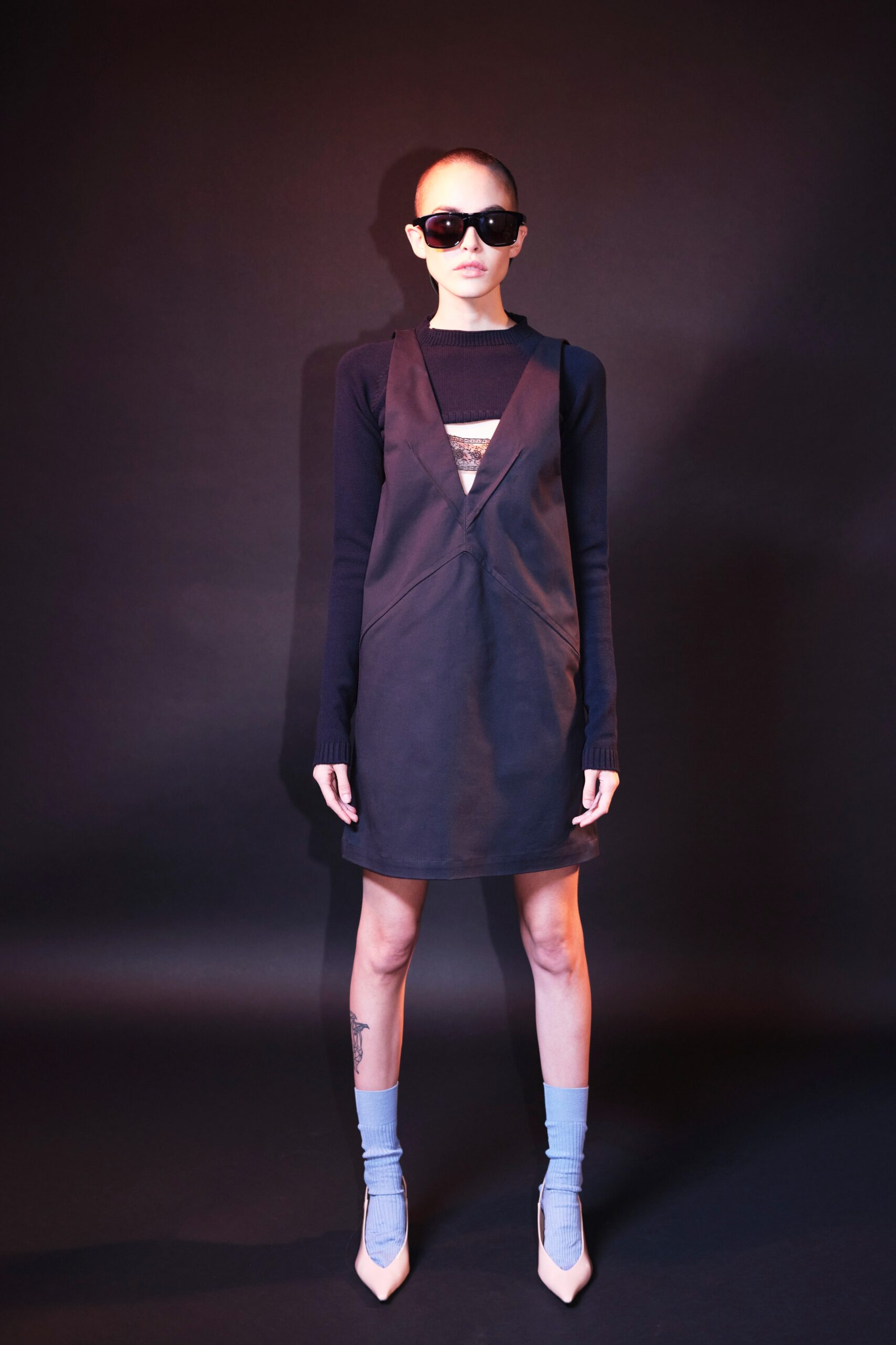 black fitted dress with long sleeves