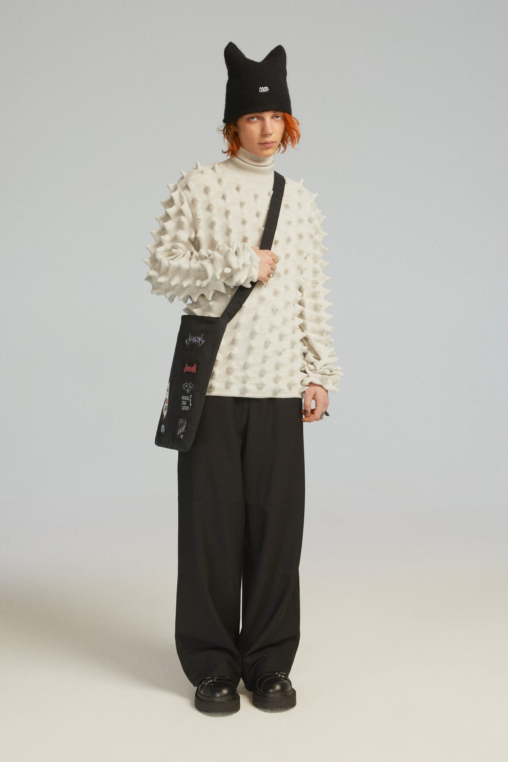 white cotton long-sleeve relaxed spiked top