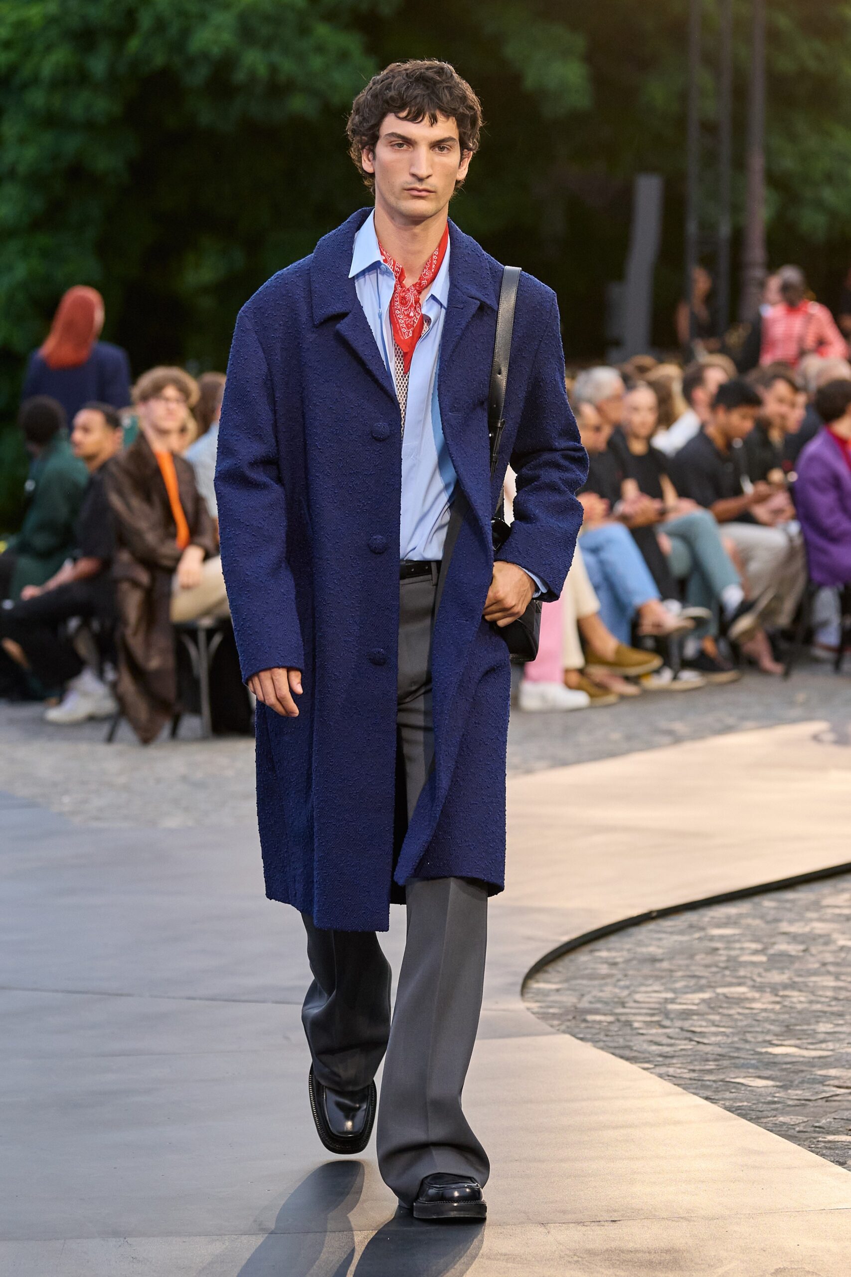 blue wool coat with gray pants