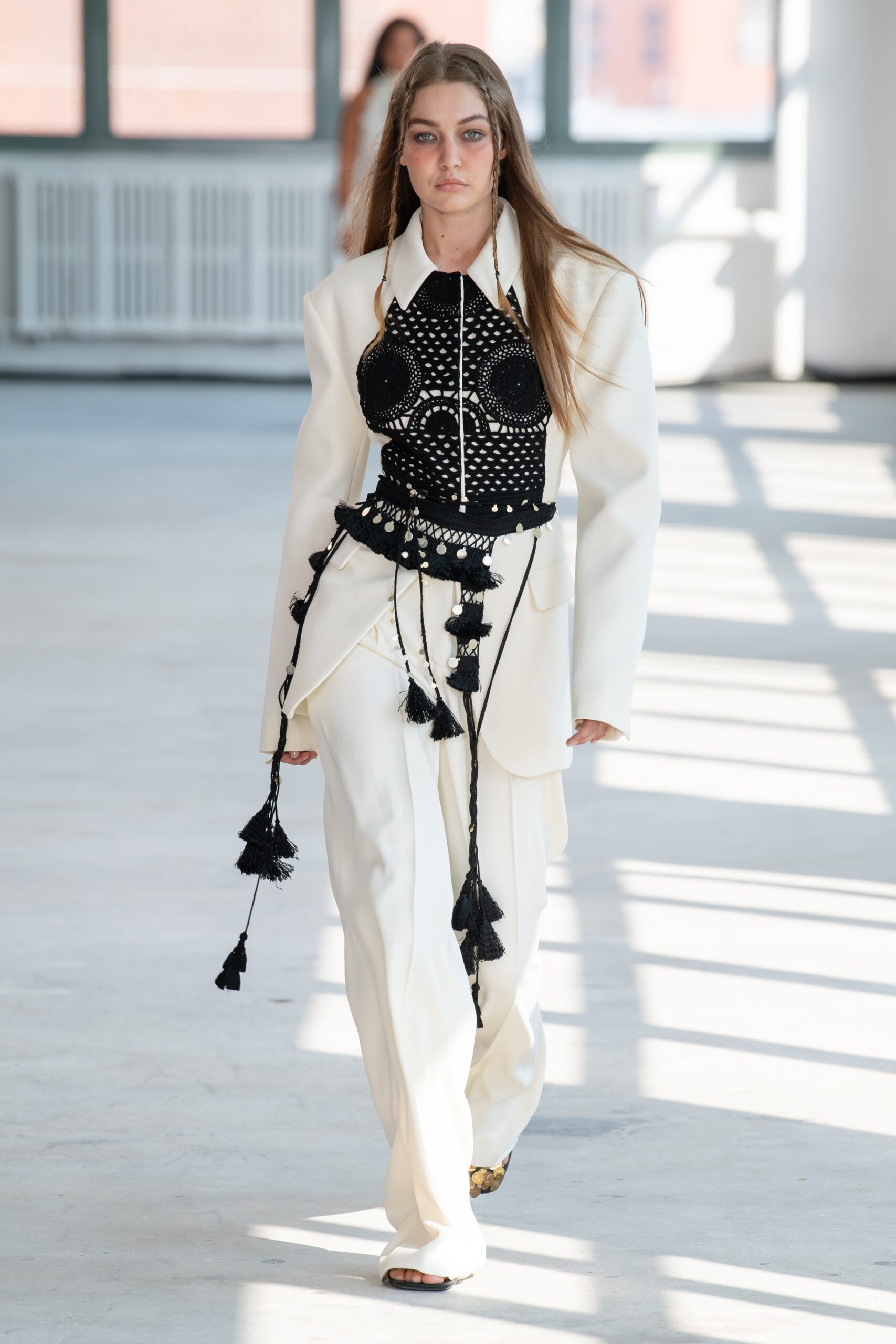 white tailored blazer with black top