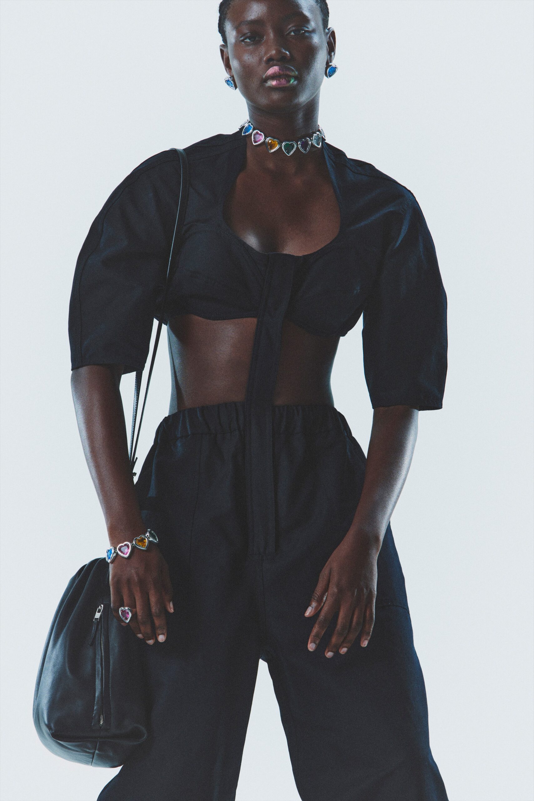 black fitted top and relaxed pants