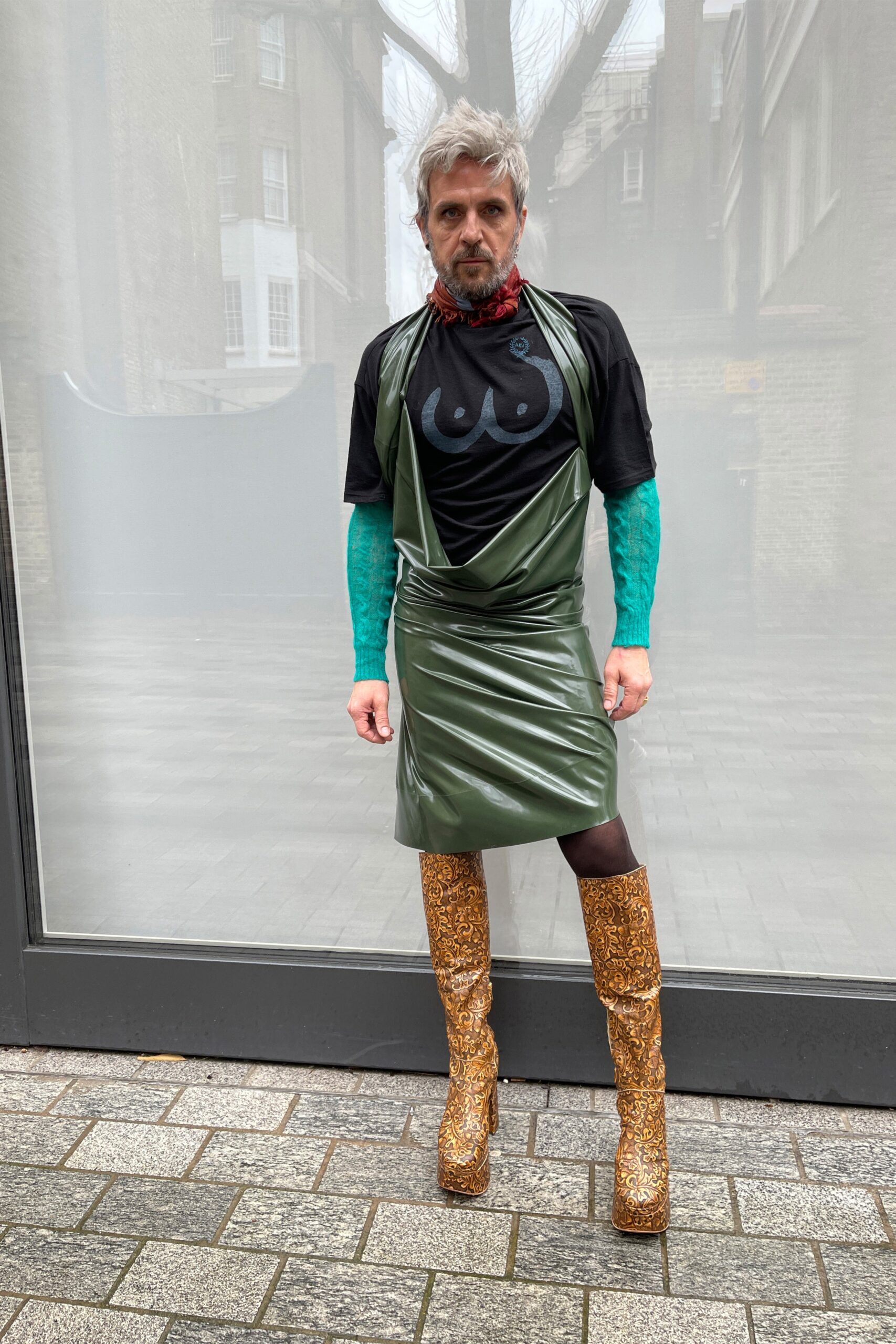 green vinyl mini dress with black t-shirt