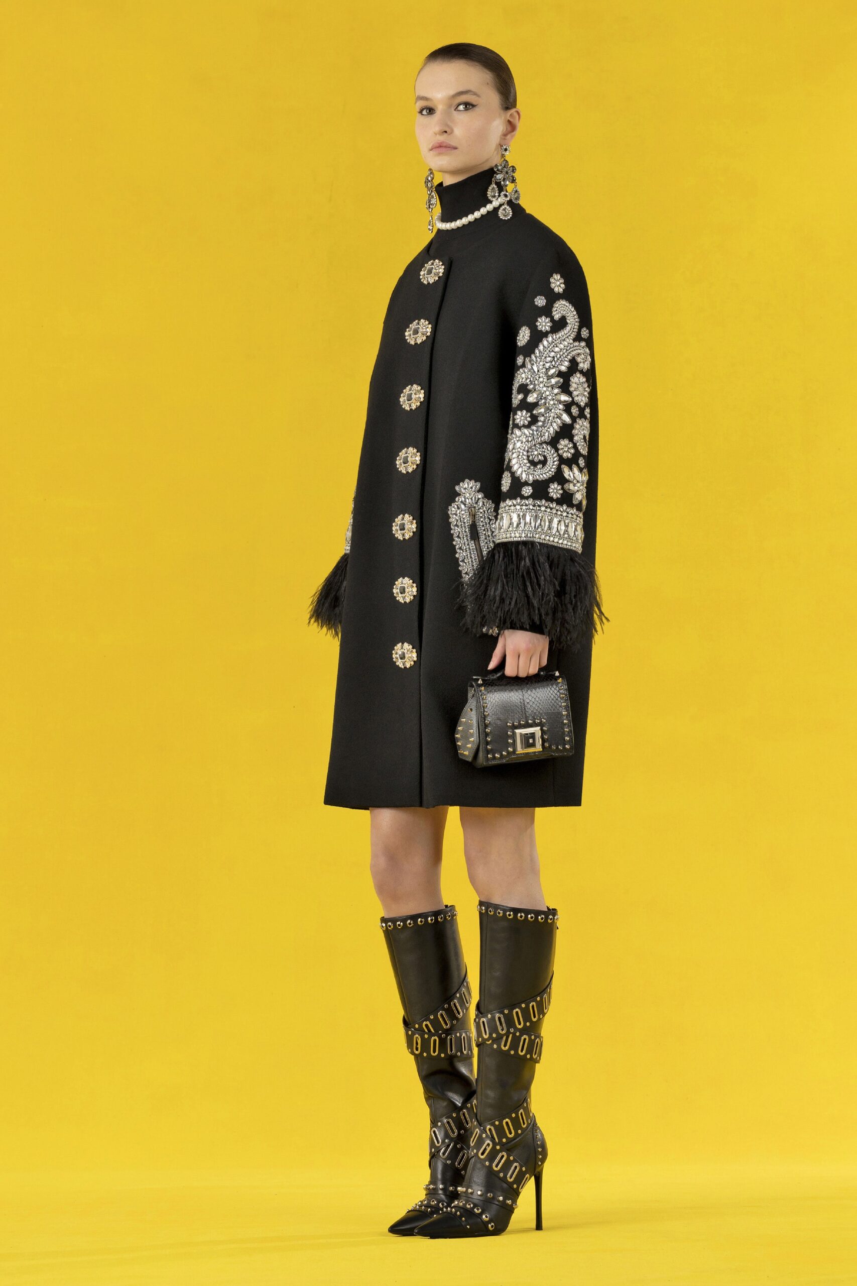 black embellished coat and boots