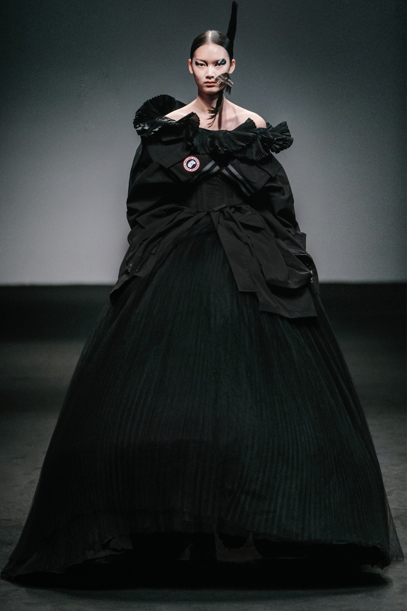 black cotton long-sleeve oversized ruffled cape