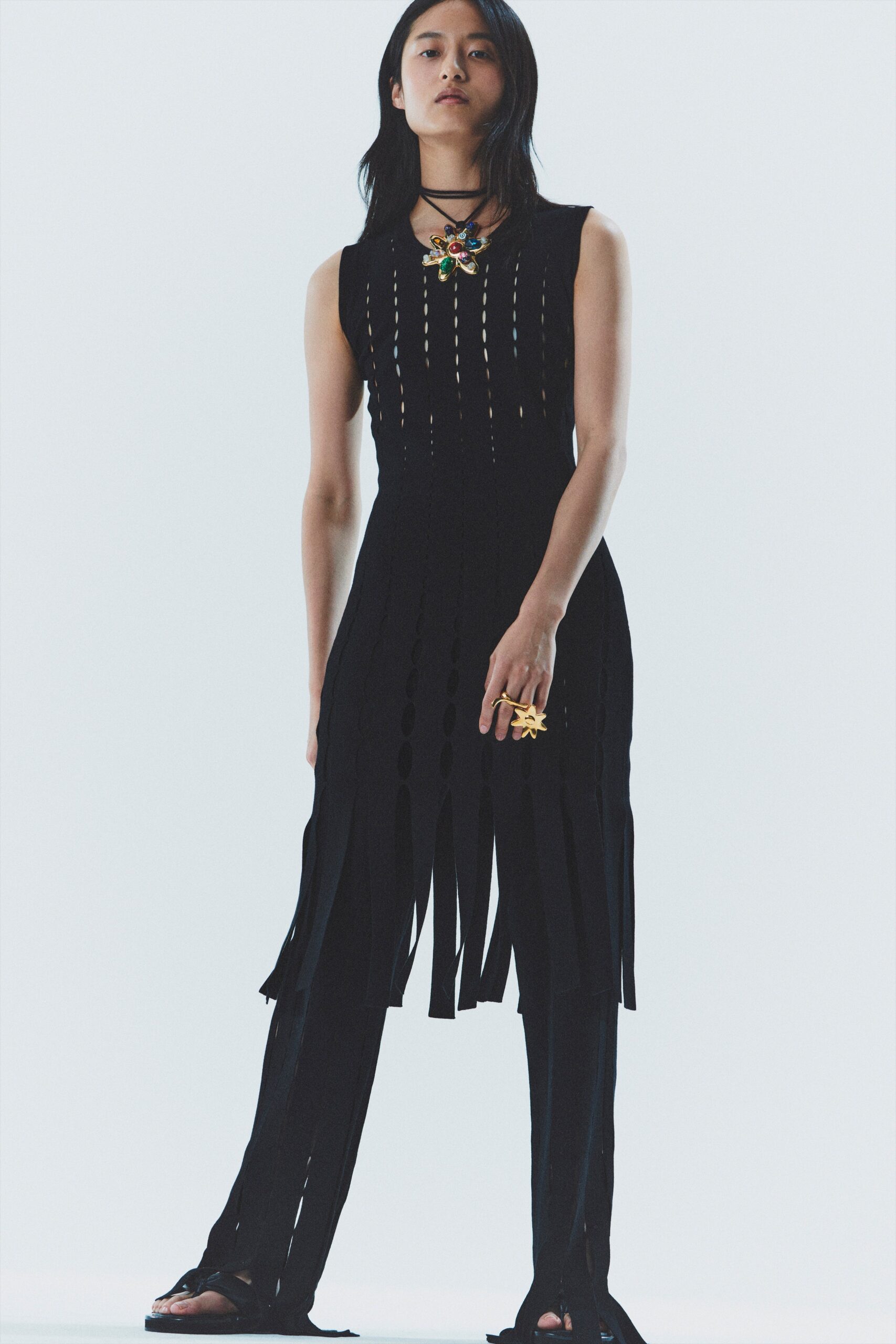 black fringed midi dress and pants