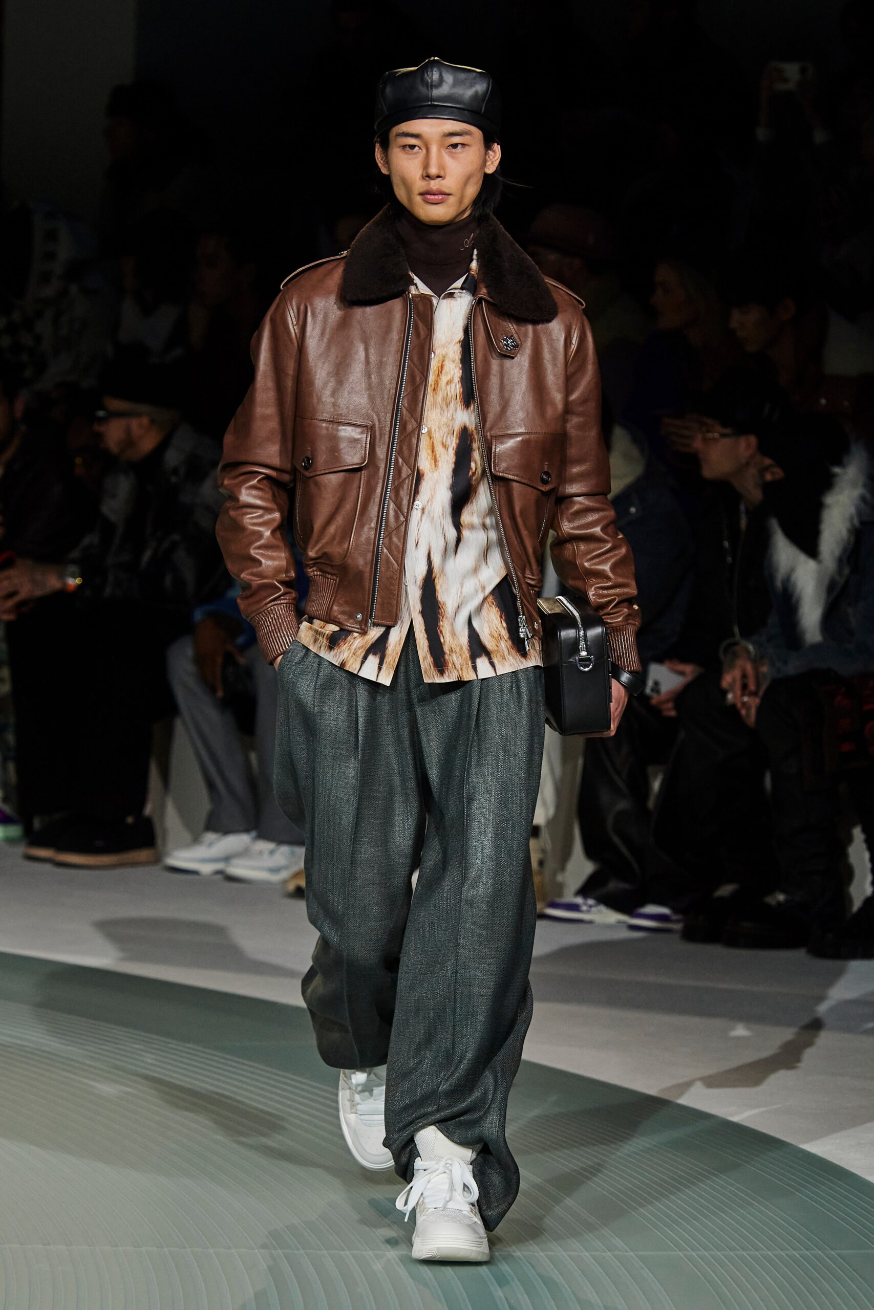 brown leather jacket with printed shirt