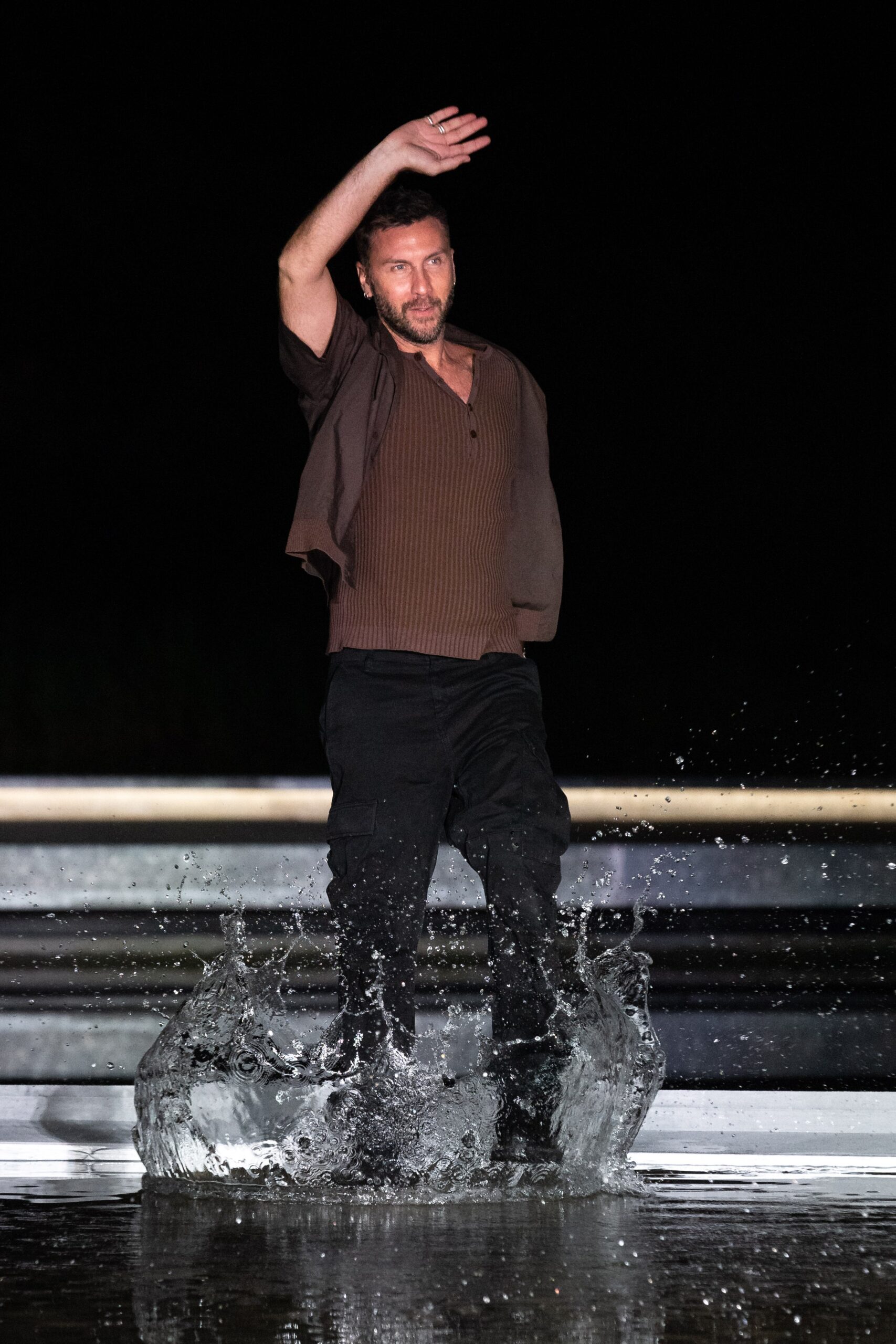 brown ribbed top and black cargo pants