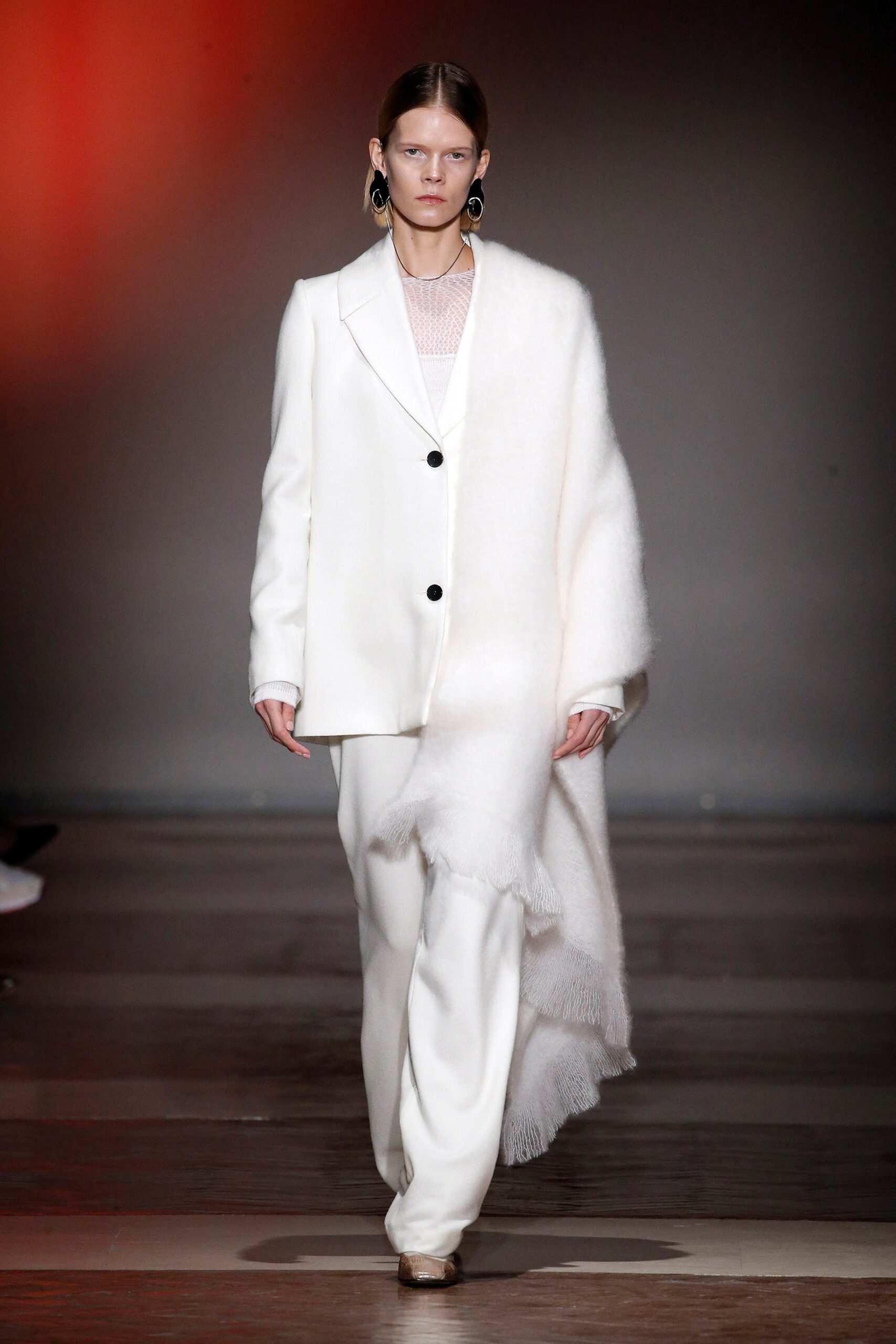 white tailored suit with scarf