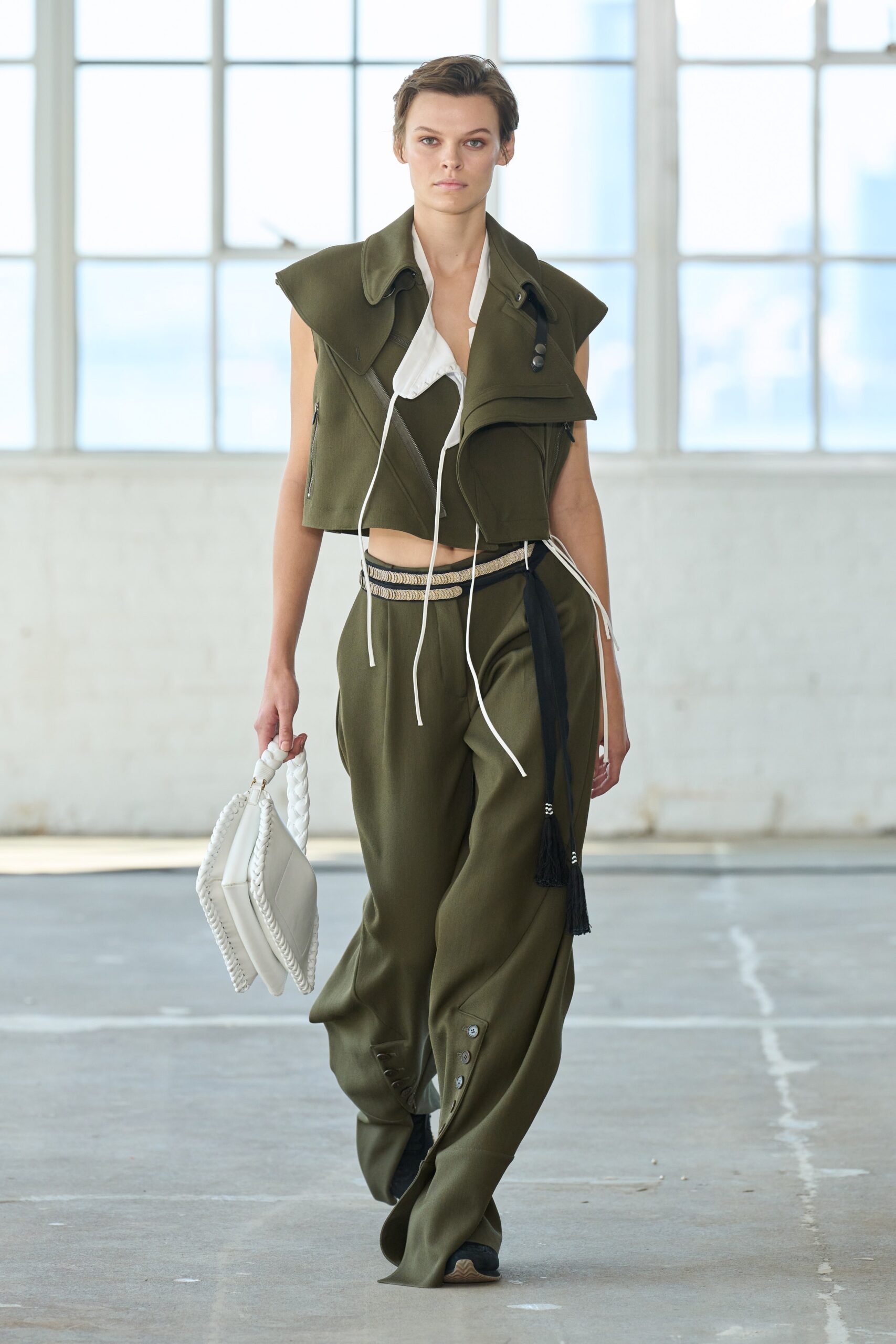green cotton sleeveless collared fitted zippered jacket