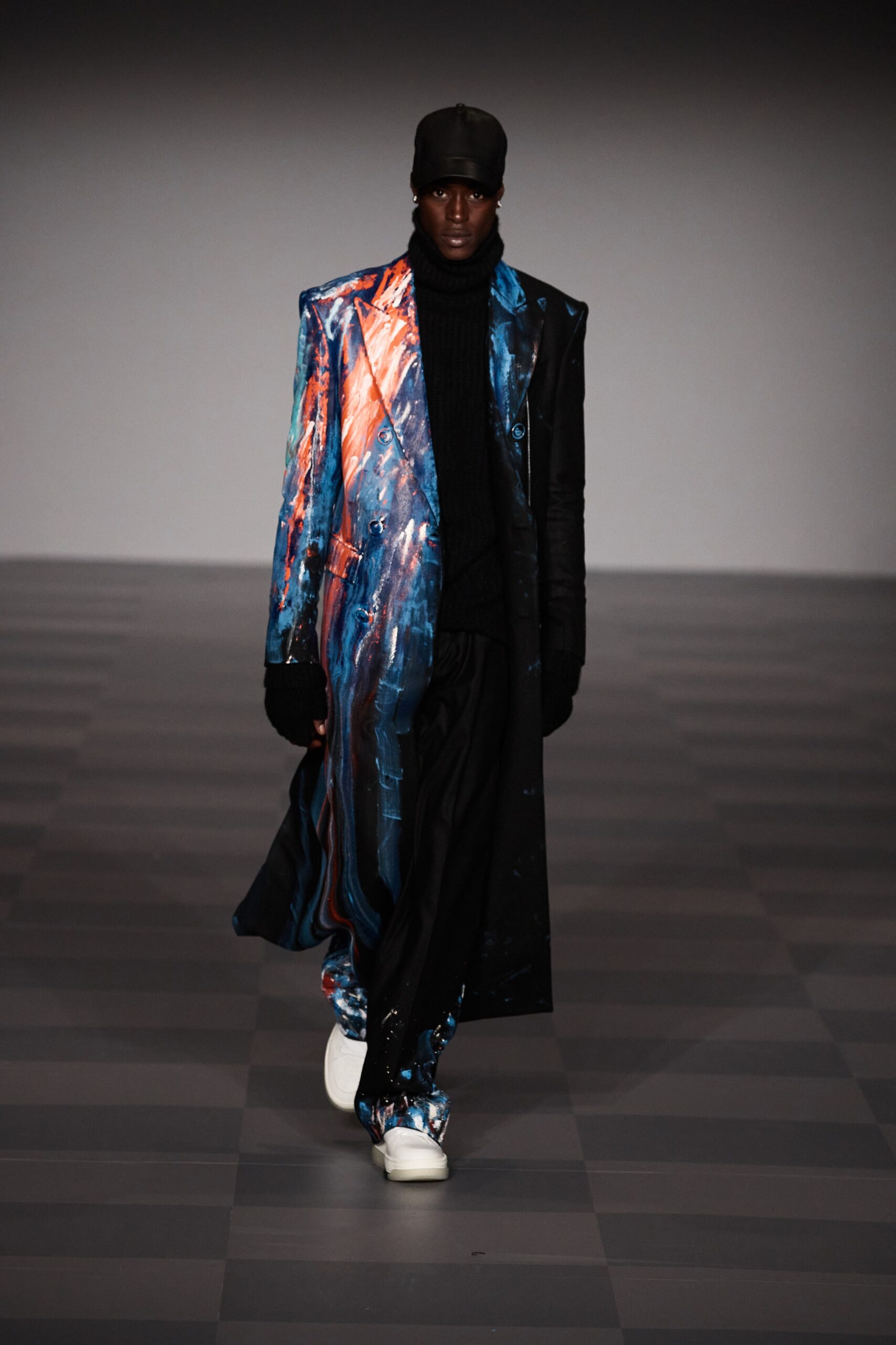 blue printed coat with black sweater