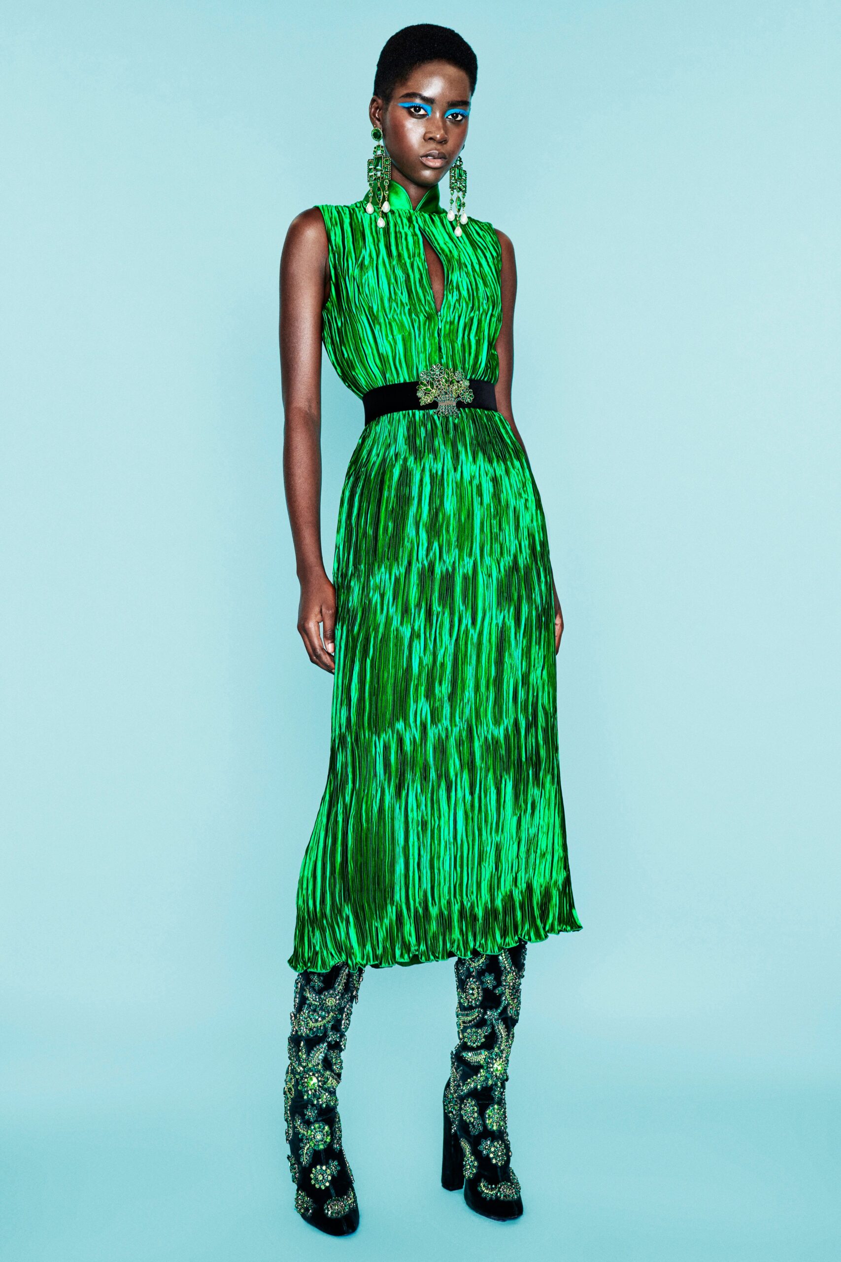 green silk sleeveless v-neck fitted pleated flowing dress