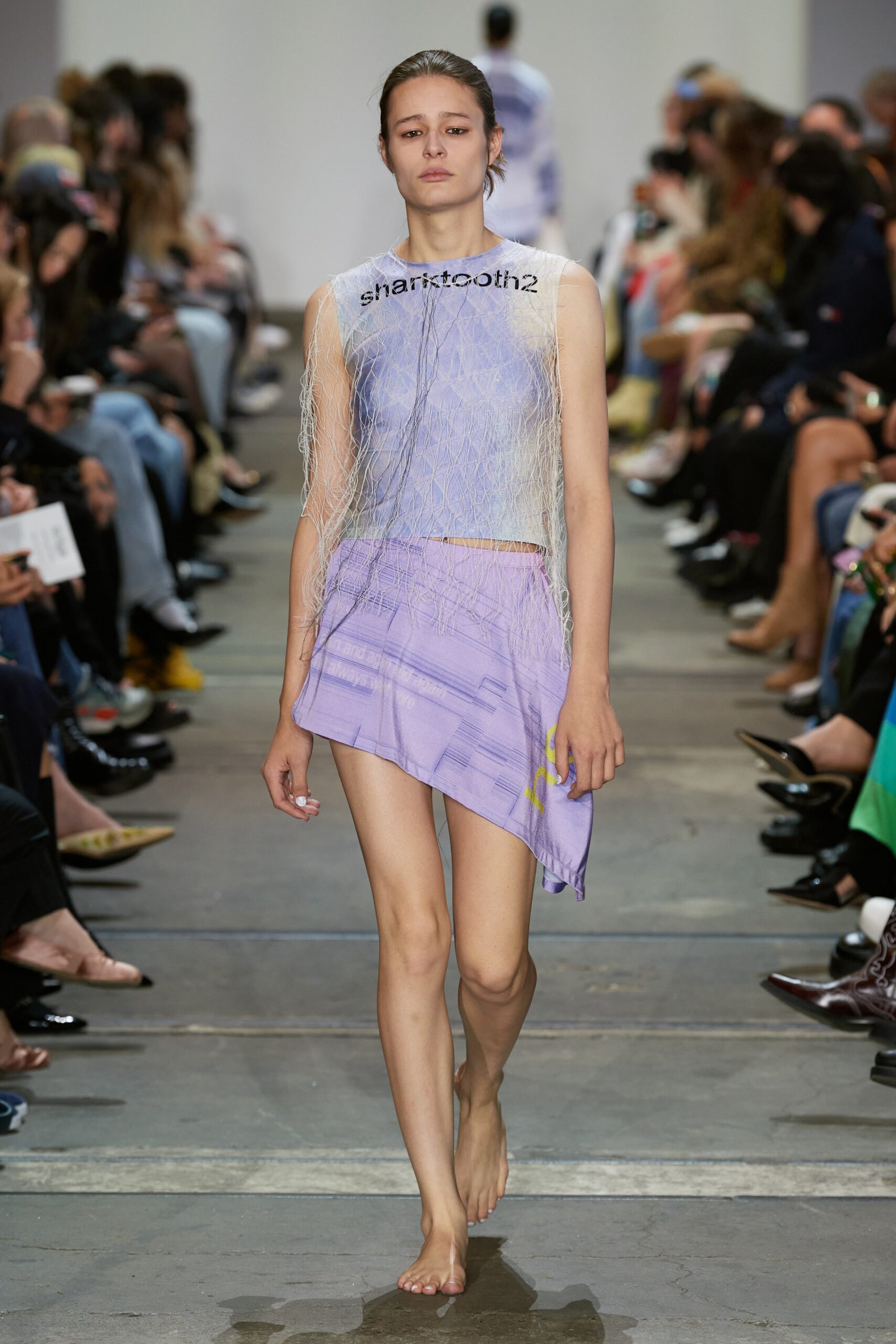 fitted white and purple top with asymmetric mini skirt