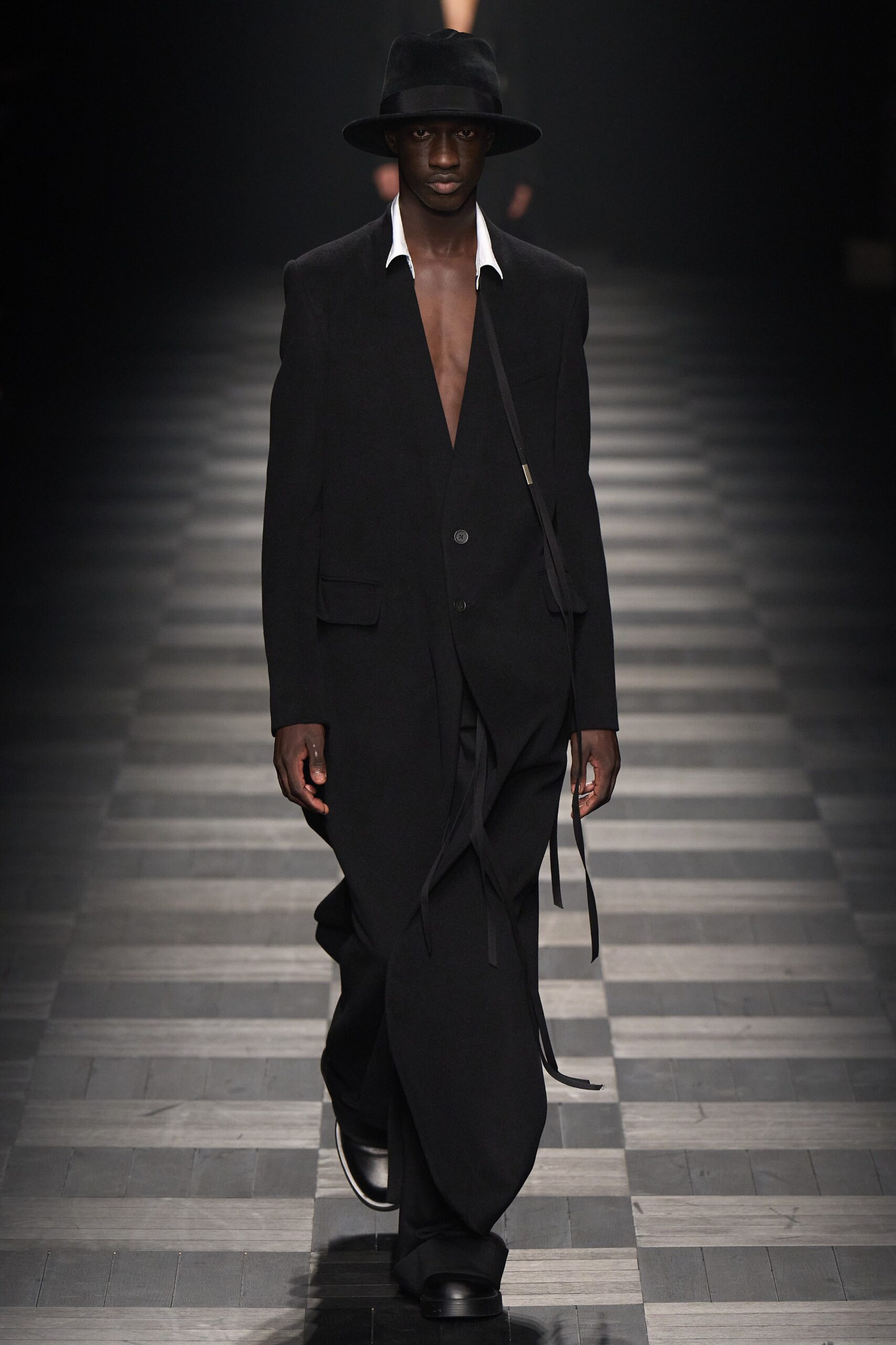 black relaxed suit with hat