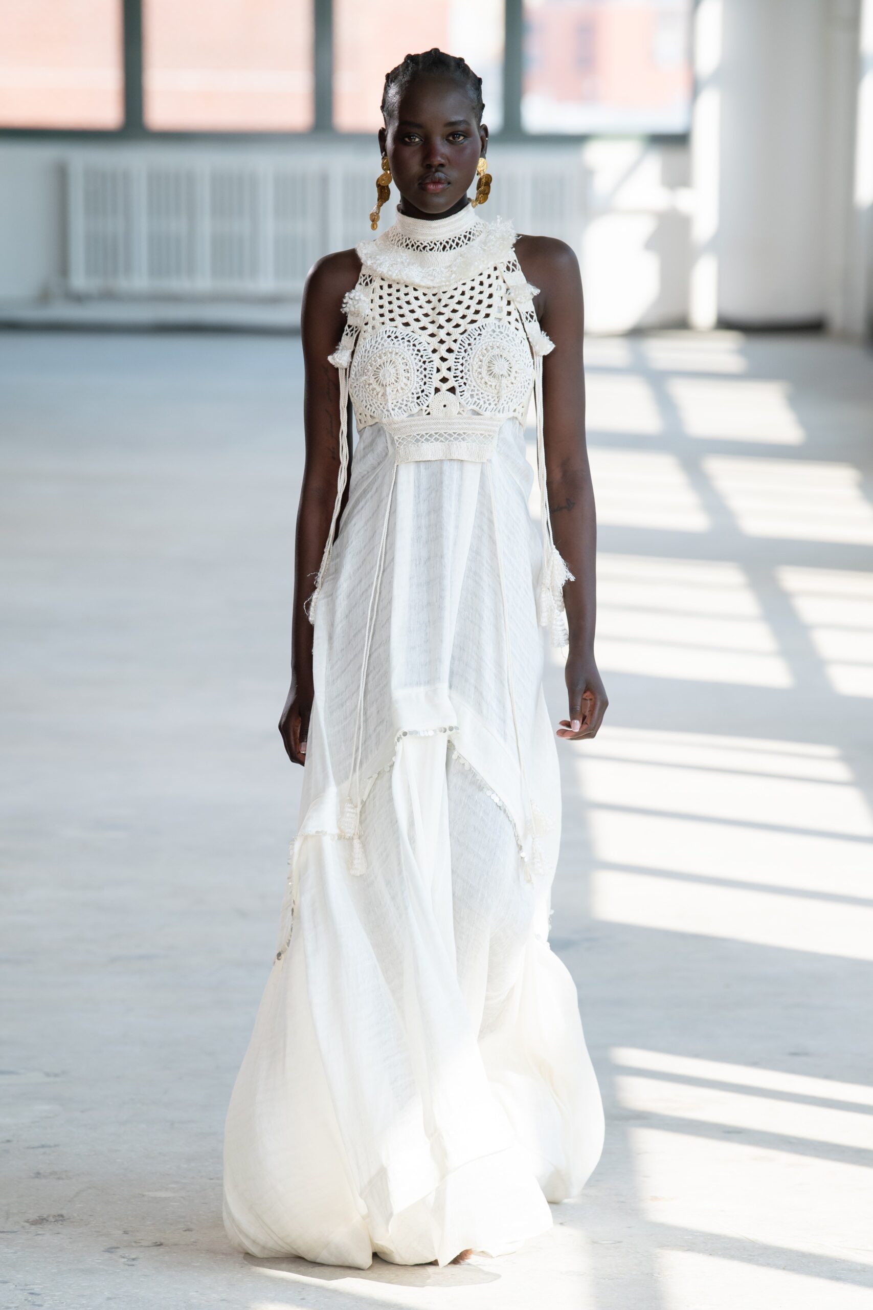 white embroidered sleeveless dress