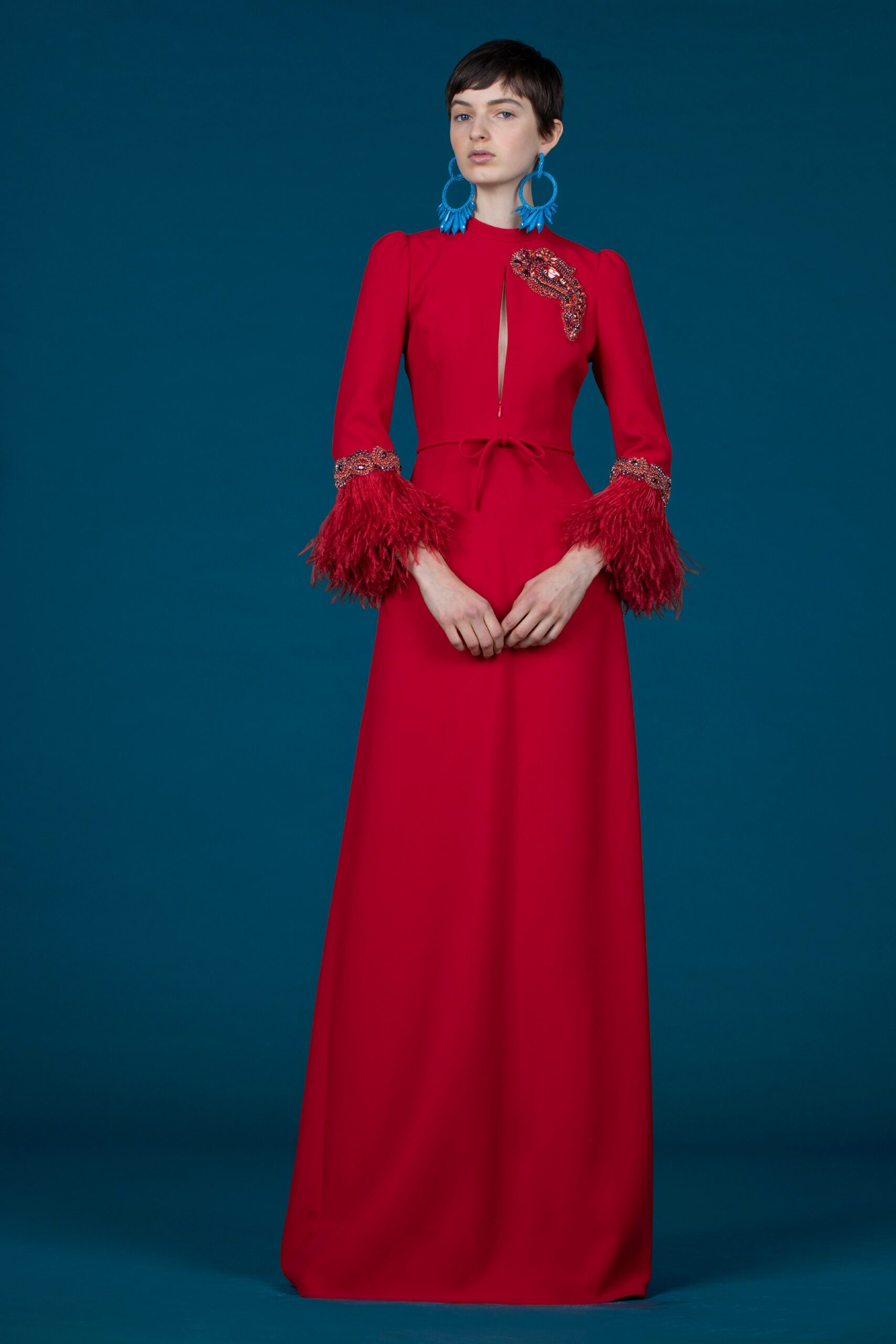 red silk long-sleeve gown