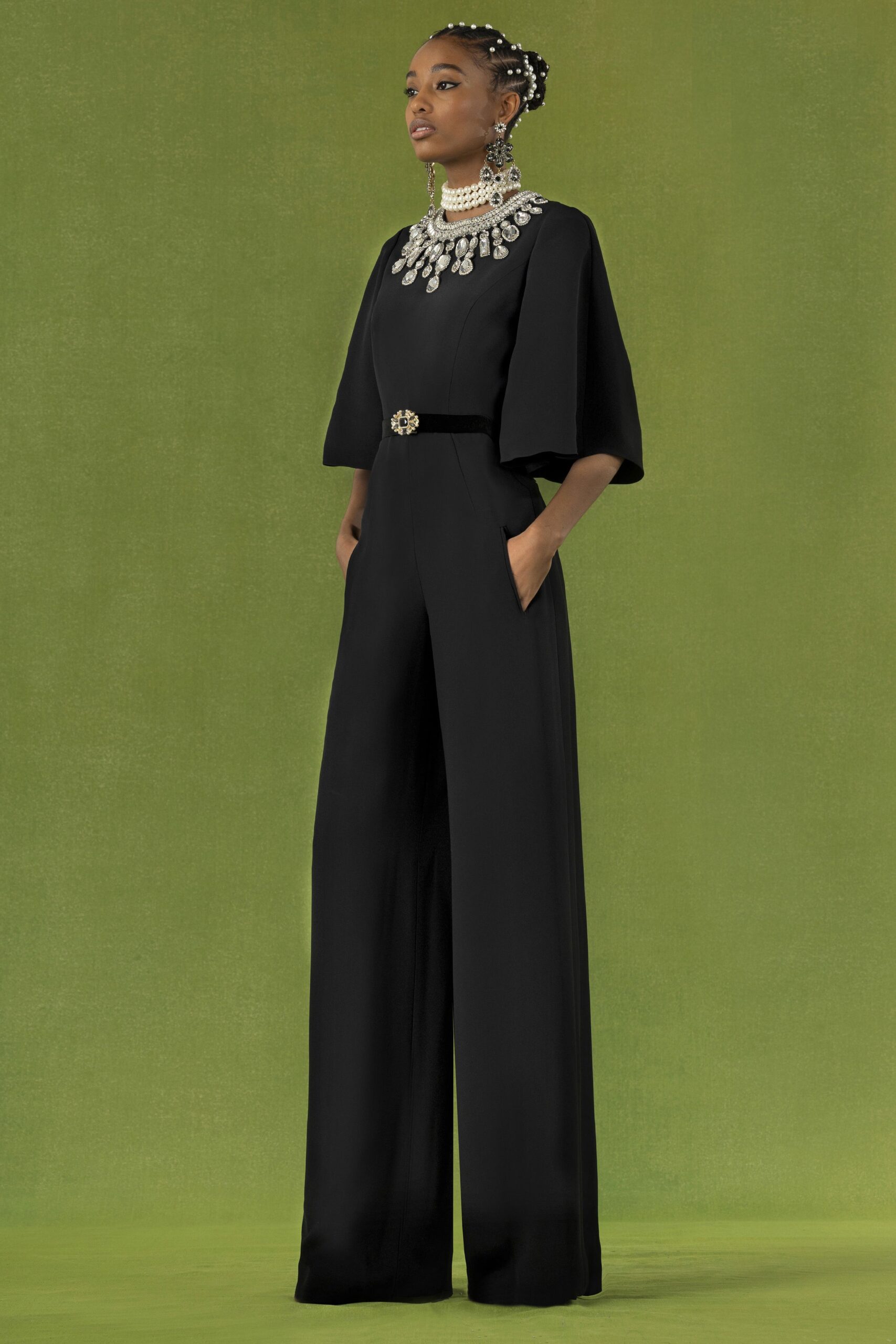 black silk fitted jumpsuit with necklace