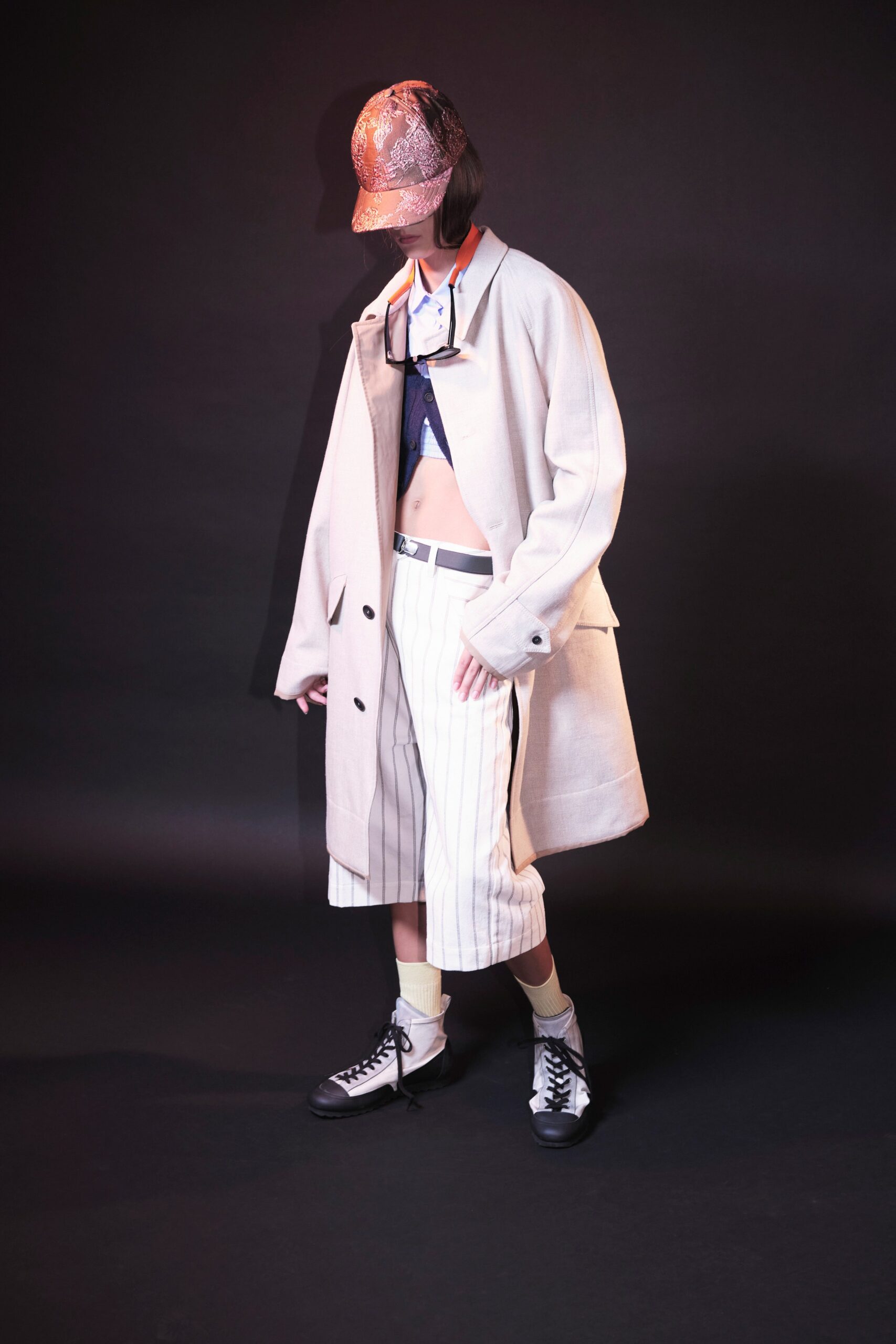 beige oversized coat with blue top