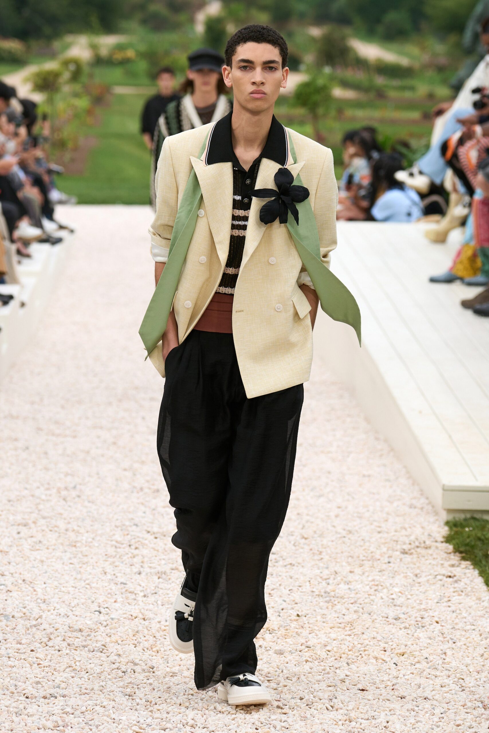 beige tailored blazer with black pants