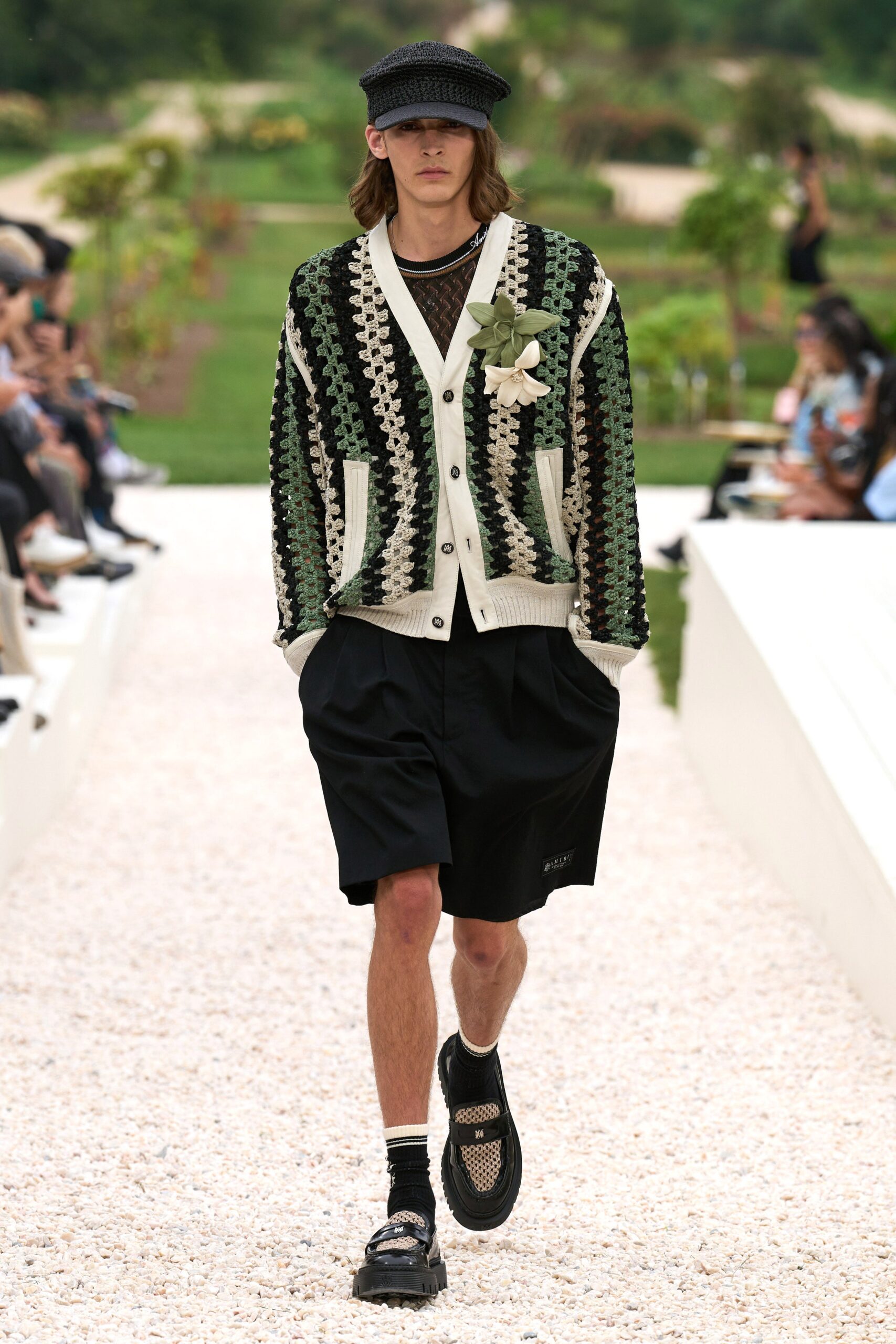 relaxed green cardigan with black shorts