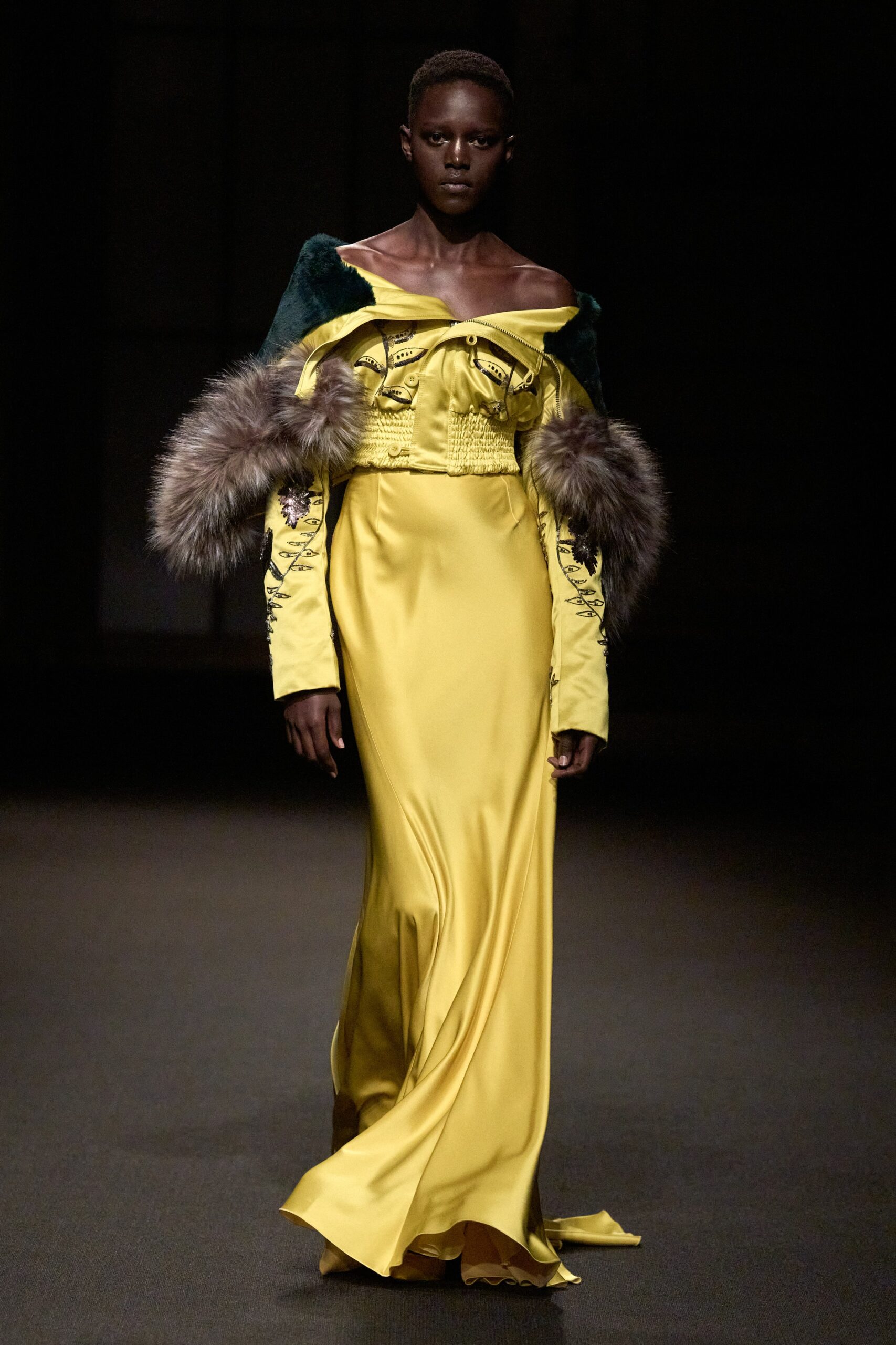 yellow silk off-shoulder gown with green velvet jacket