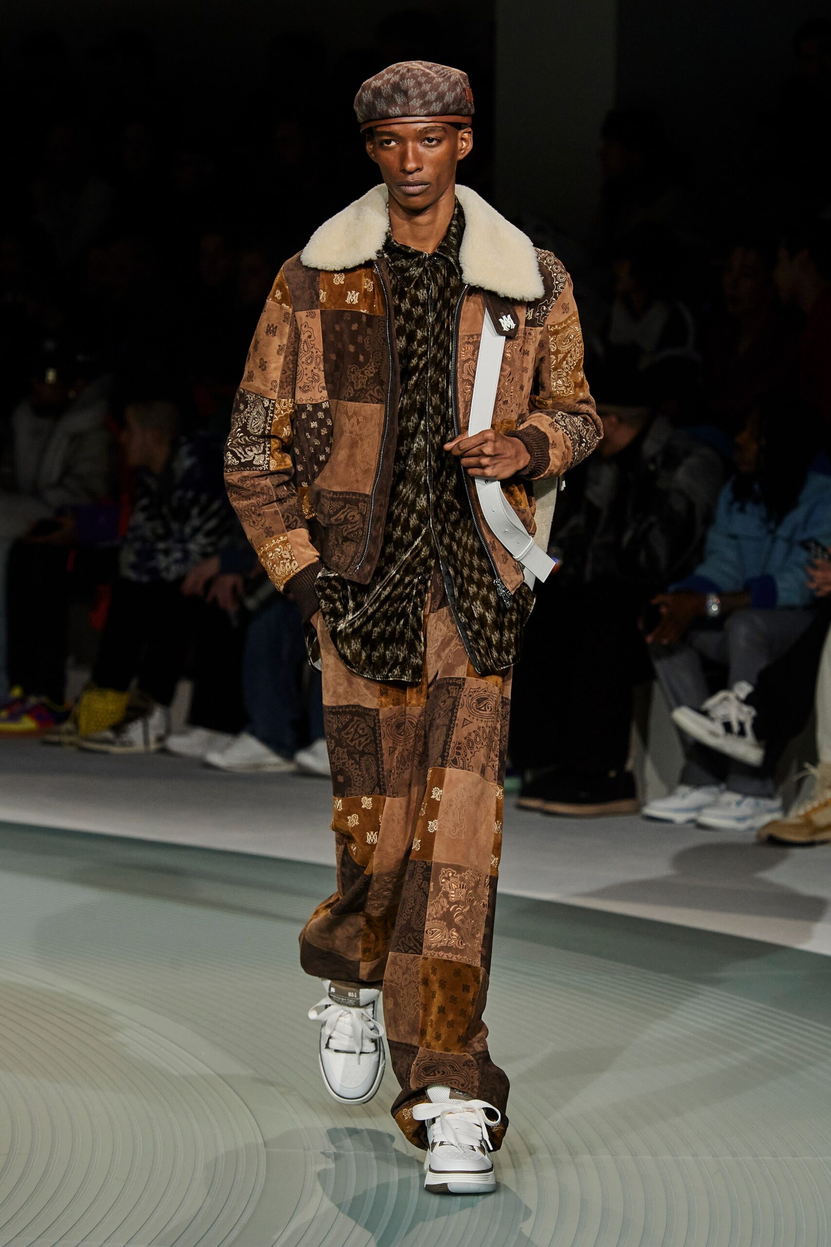 brown patchwork jacket with black shirt