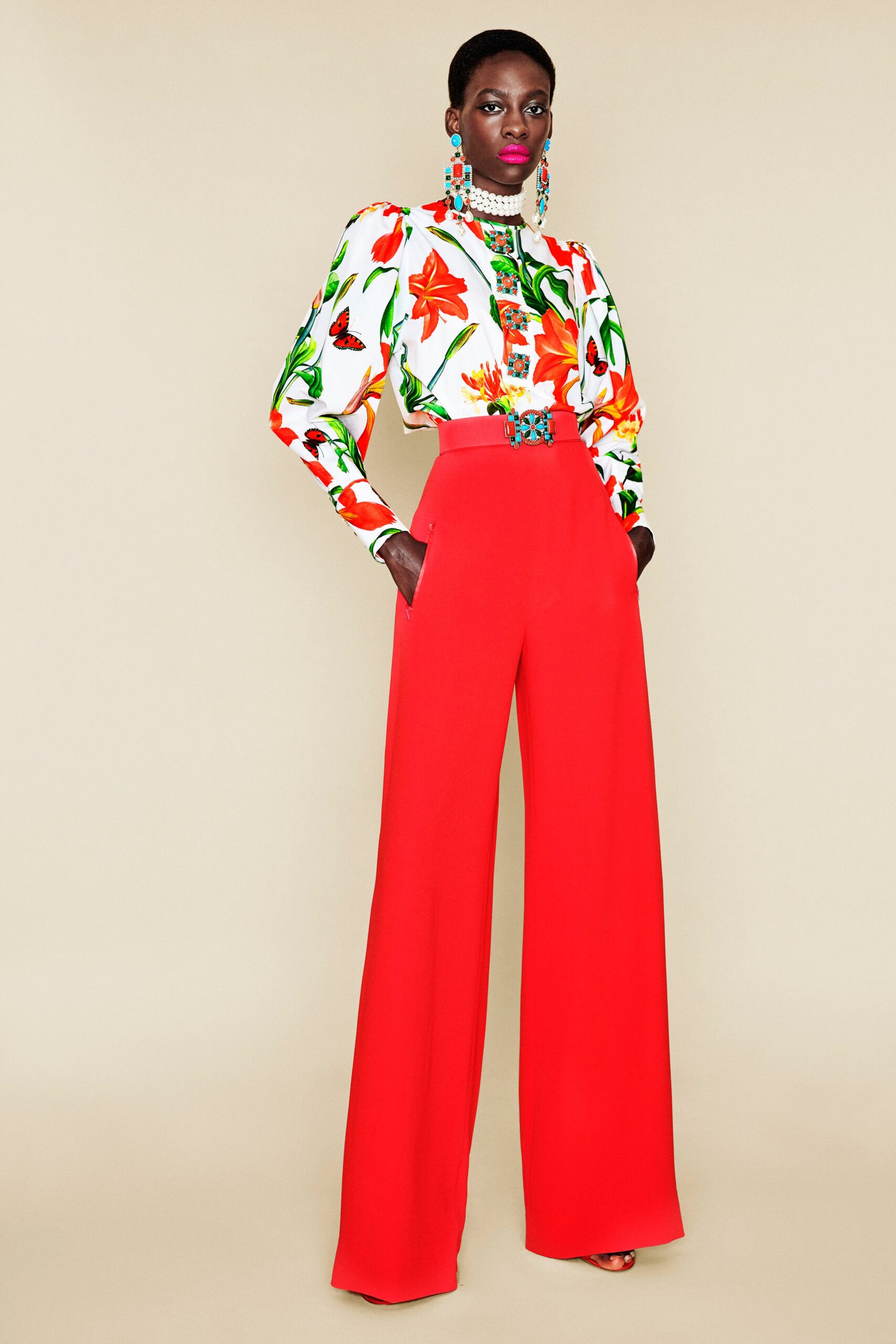 floral shirt and red wide-leg pants
