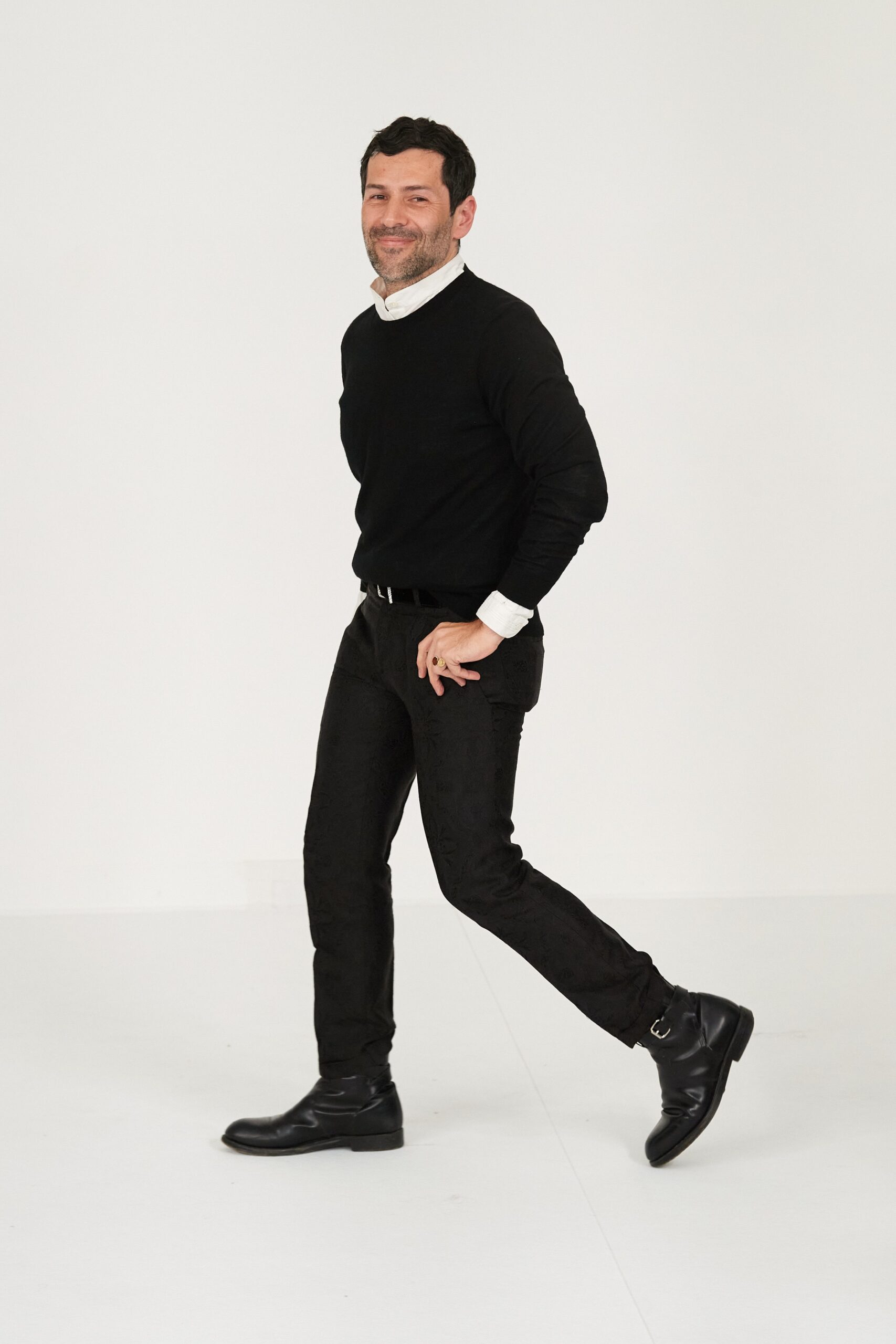 black fitted sweater and pants