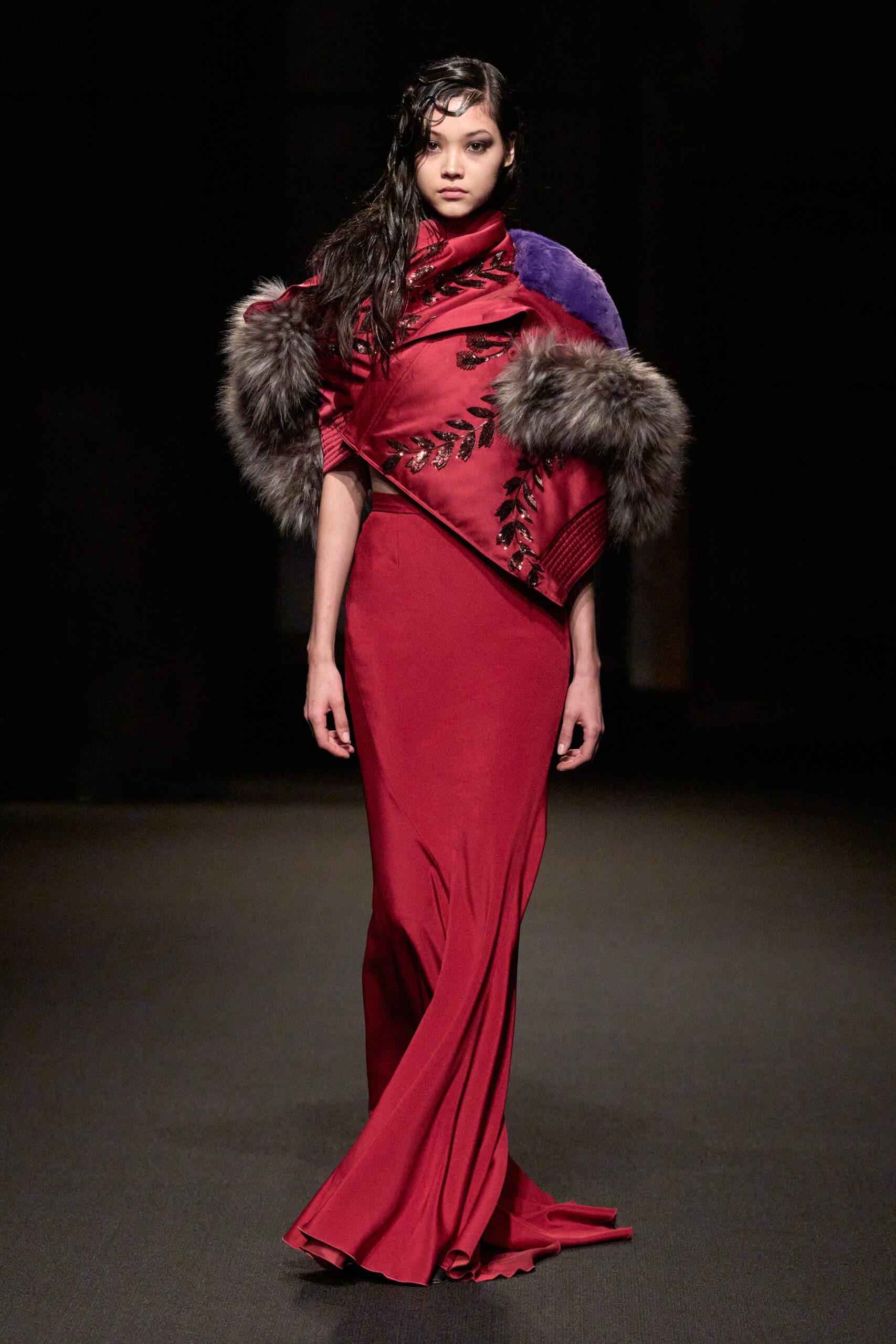 red silk fitted gown with cape