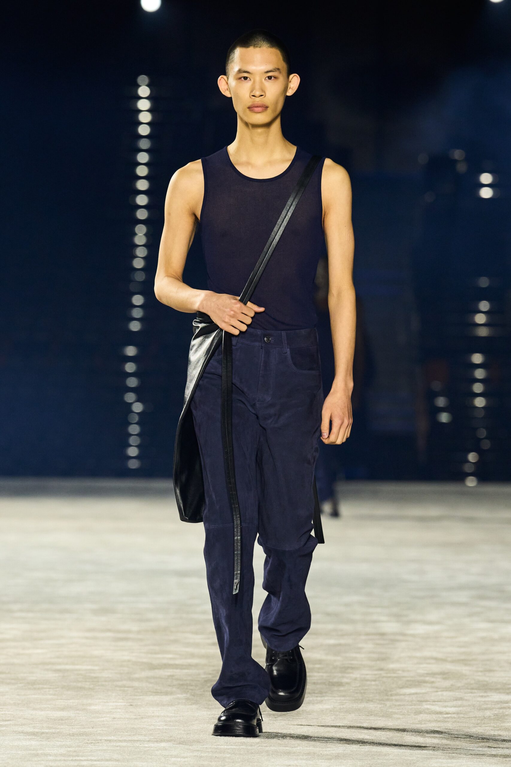 black tank-top and navy pants