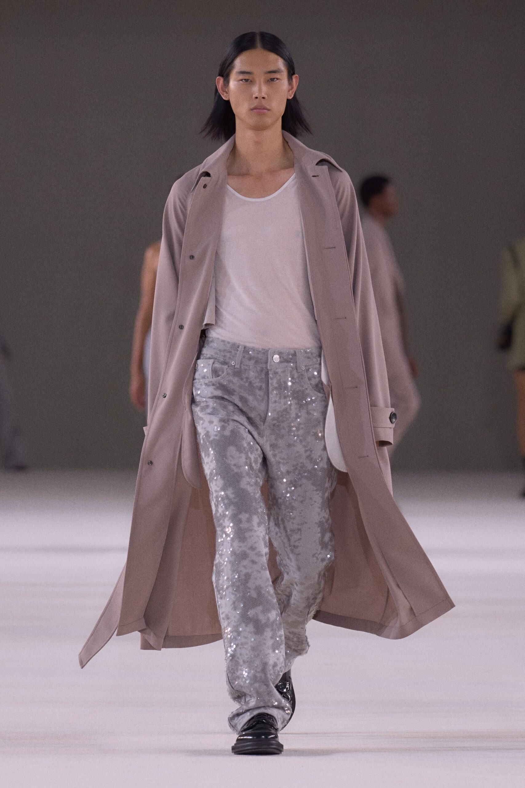beige trench coat with sequined pants
