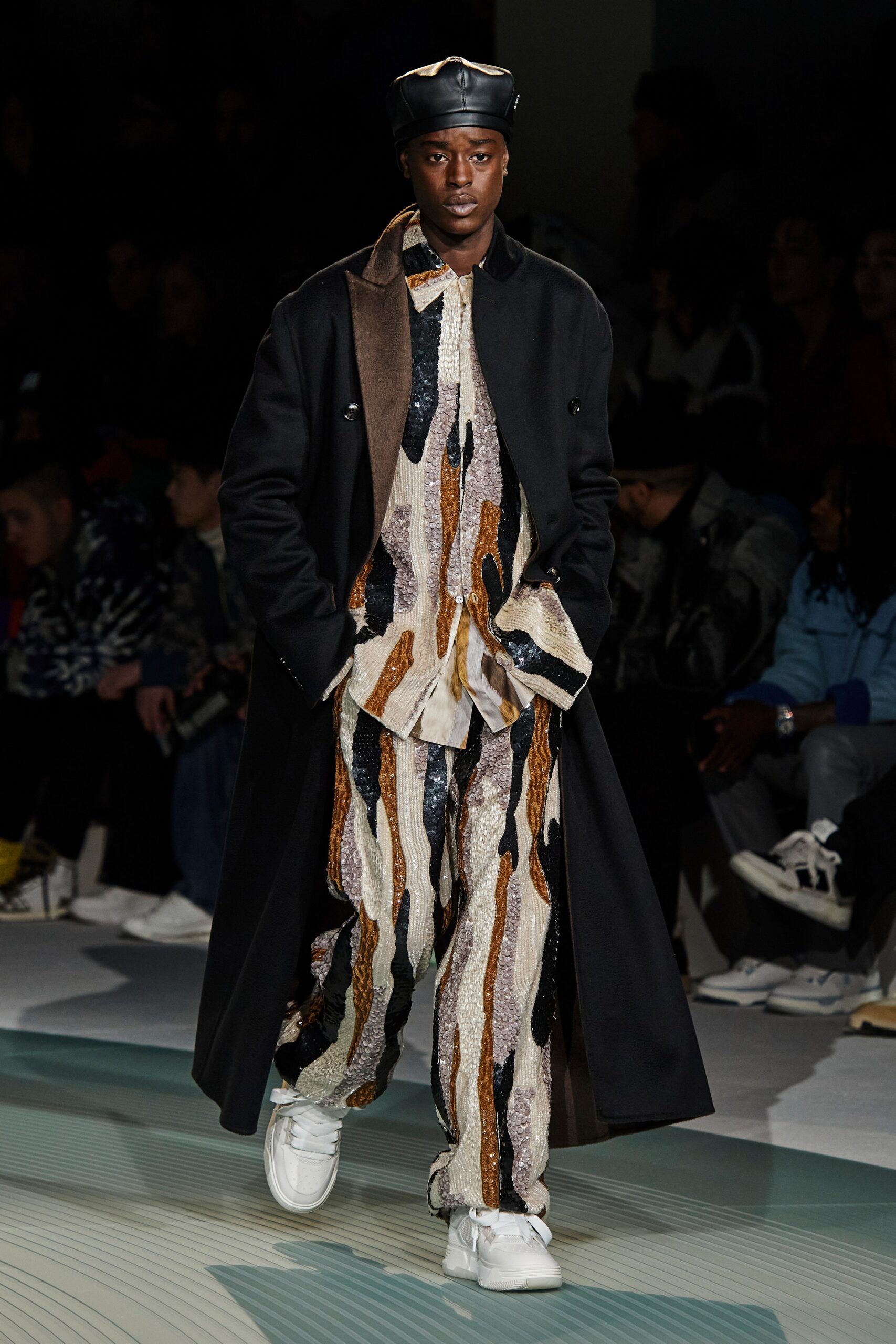 black coat multi-patterned shirt pants