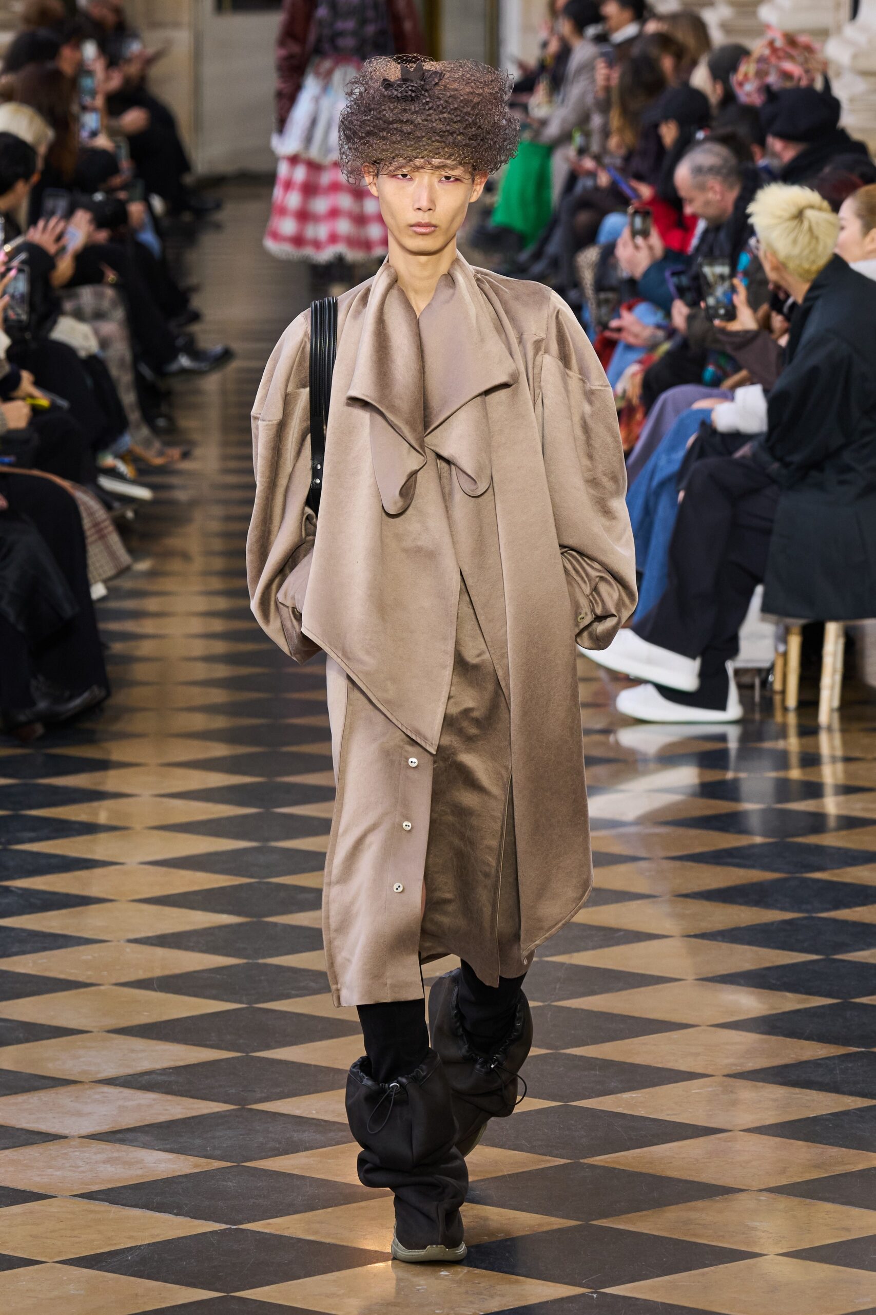 beige oversized coat with black pants