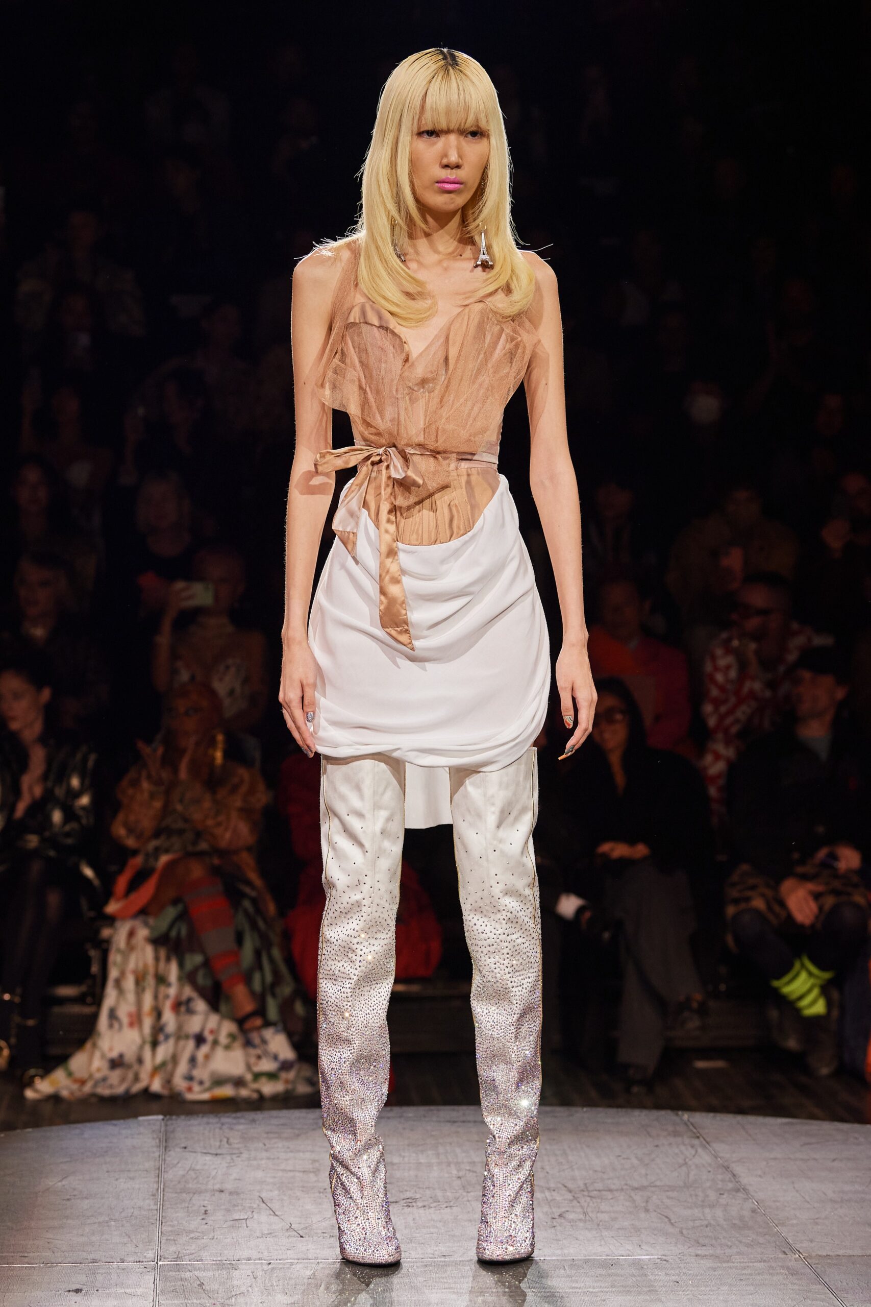 white silk sleeveless dress with shiny pants