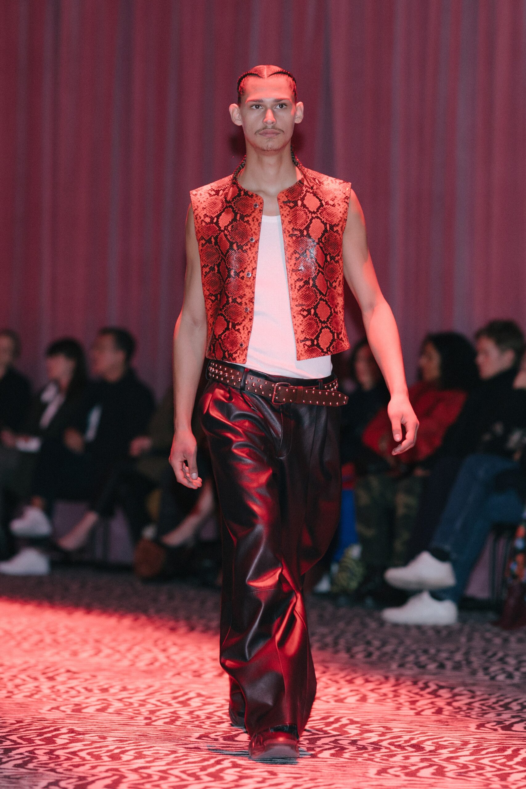 red leather sleeveless fitted printed vest