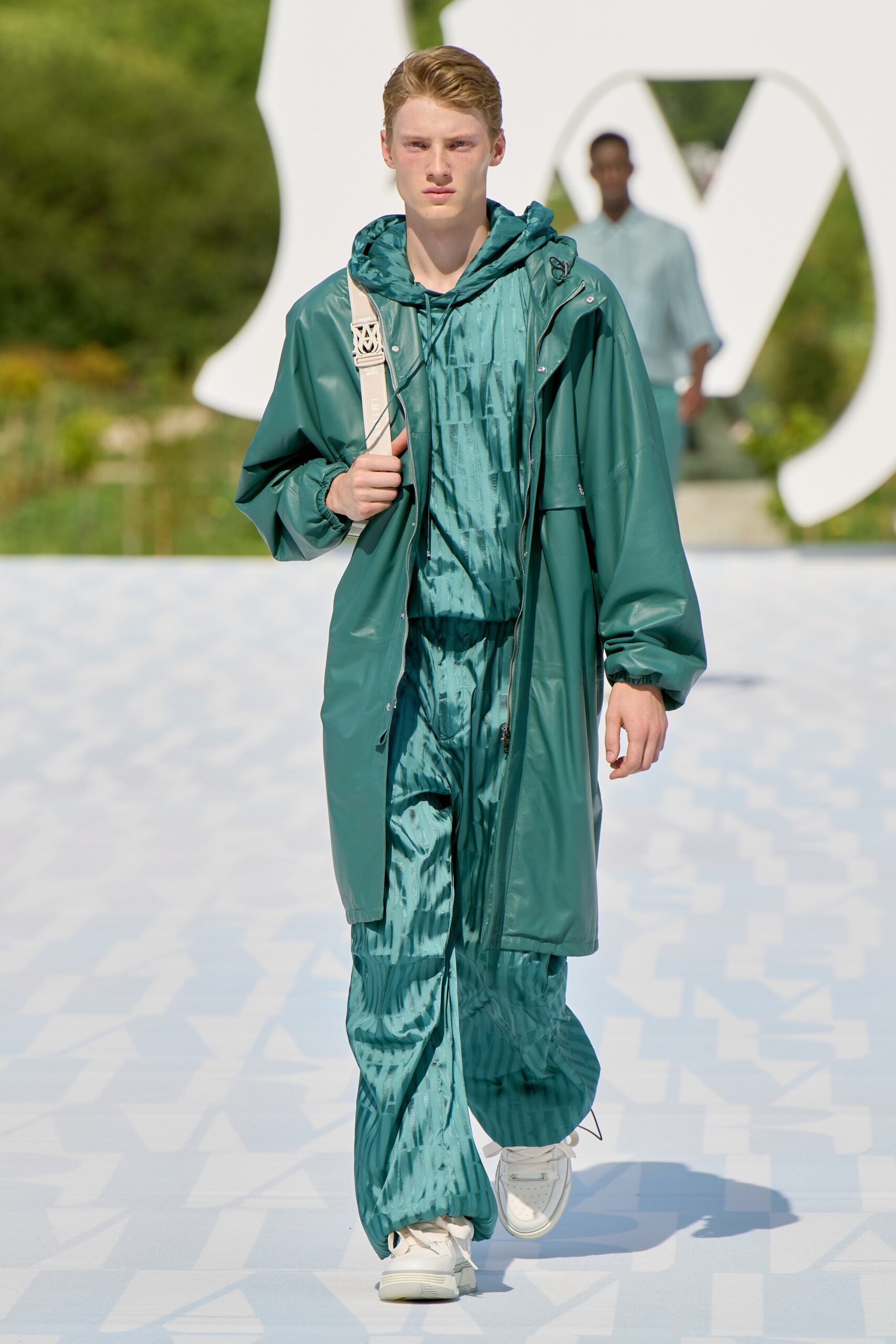 teal vinyl coat and jumpsuit