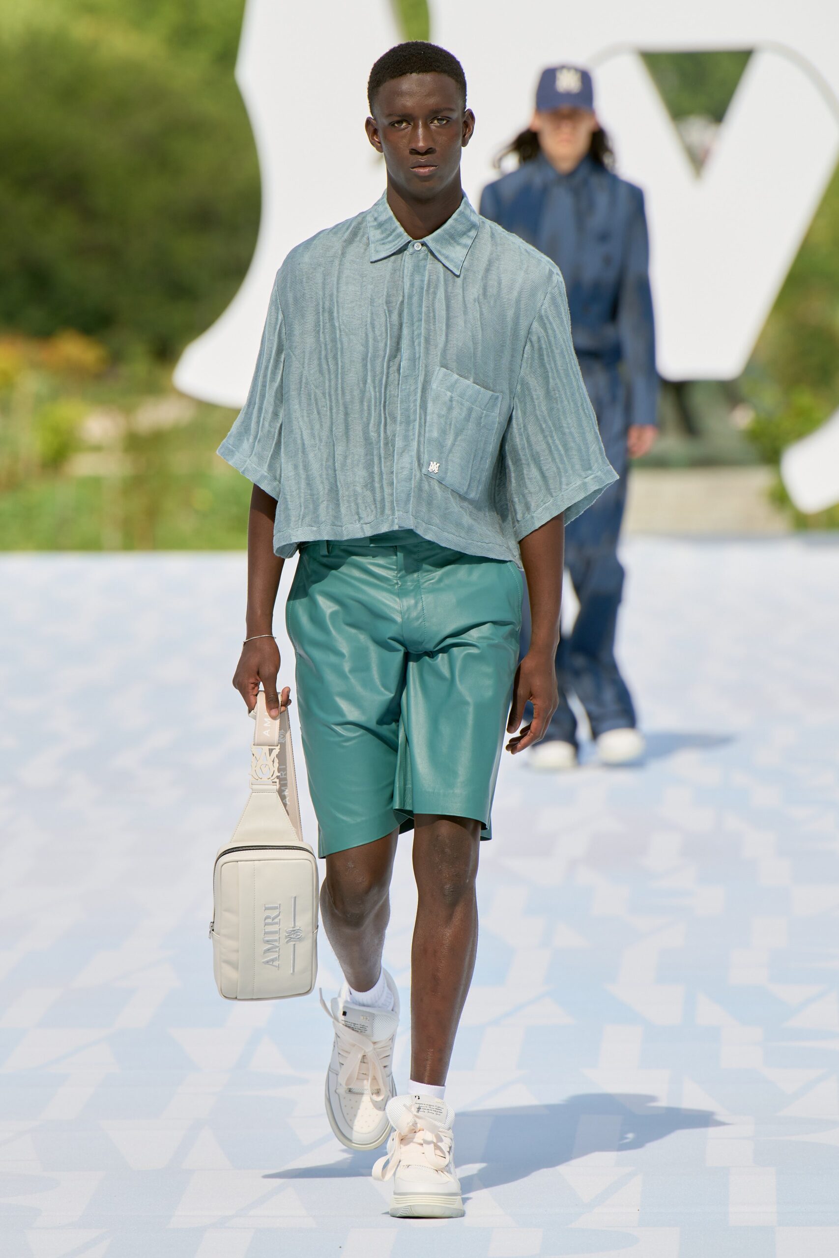 blue cotton shirt green leather shorts