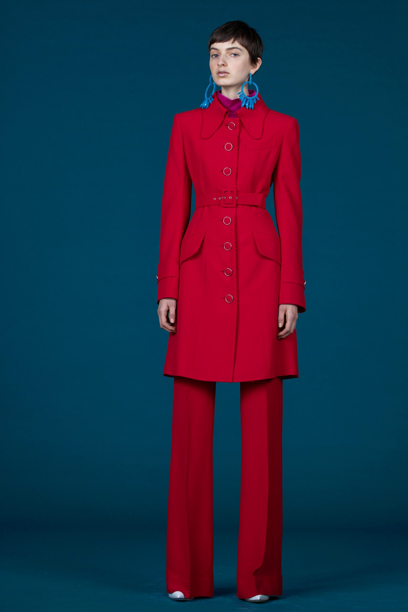 red long-sleeve collared fitted buttoned belted coat
