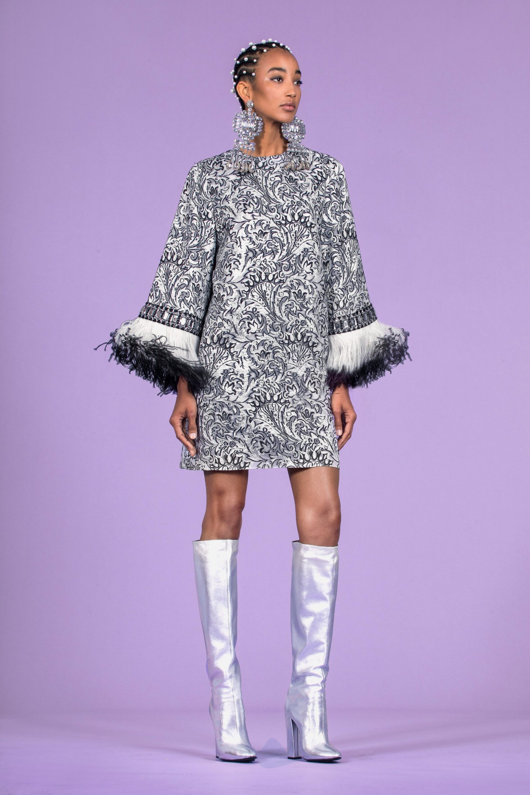 black and white embroidered dress with silver boots