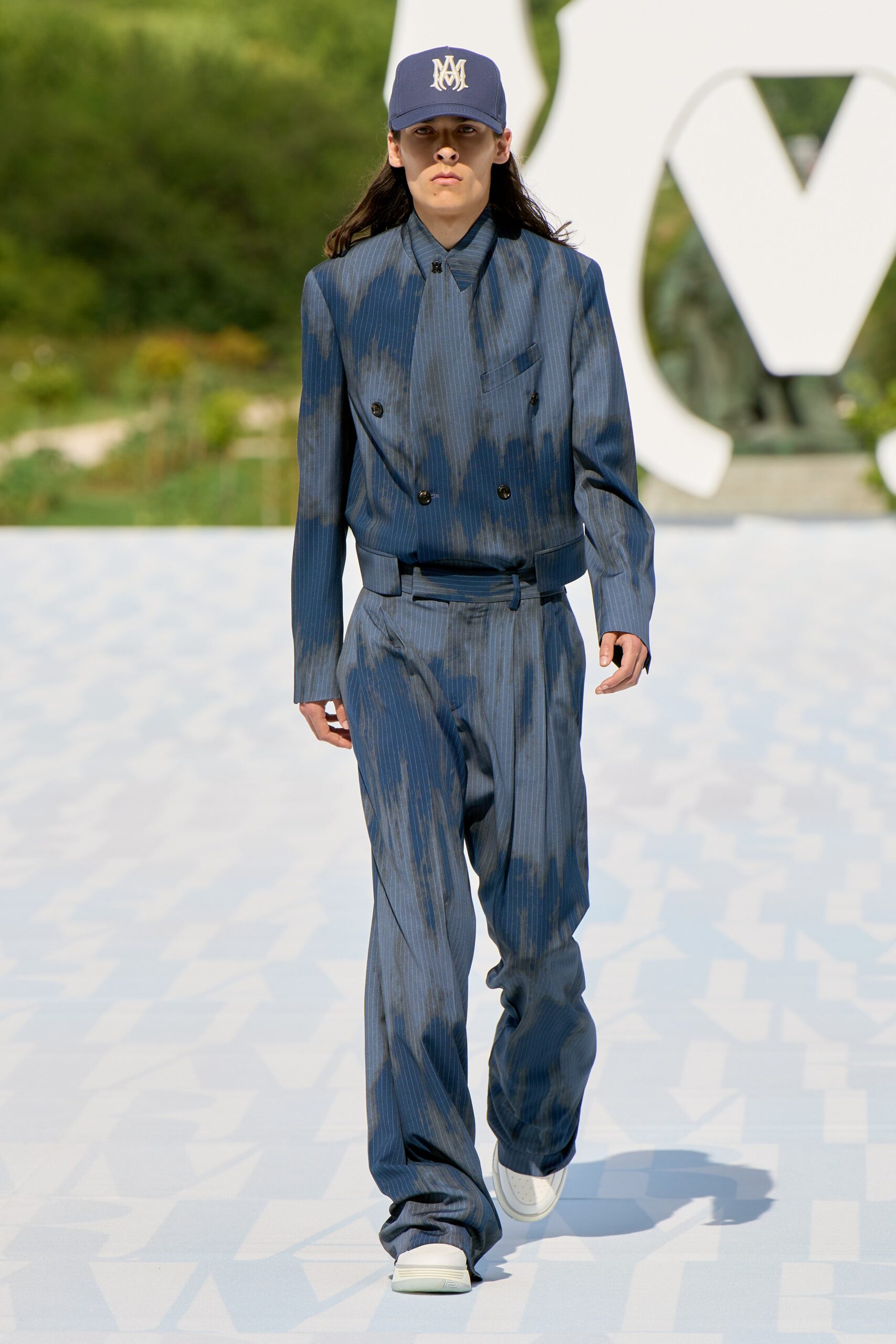 blue tailored suit with hat
