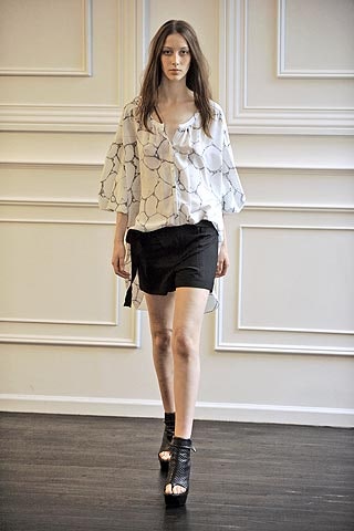 white printed blouse with black skirt