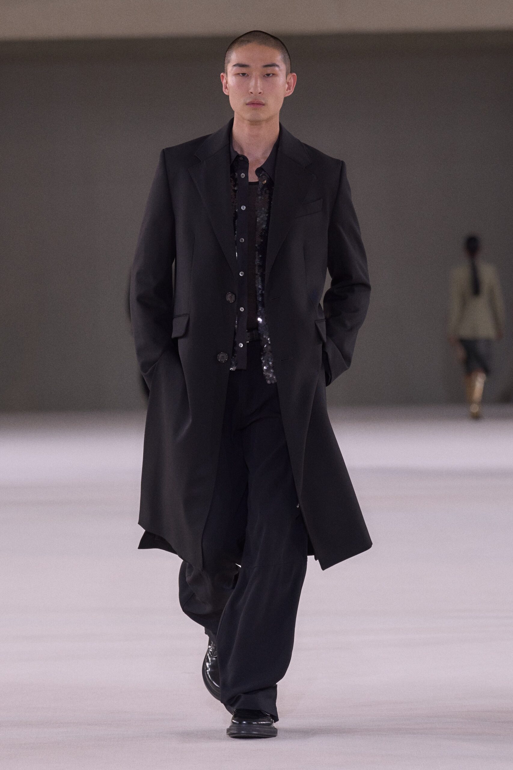 black wool coat with sequined shirt