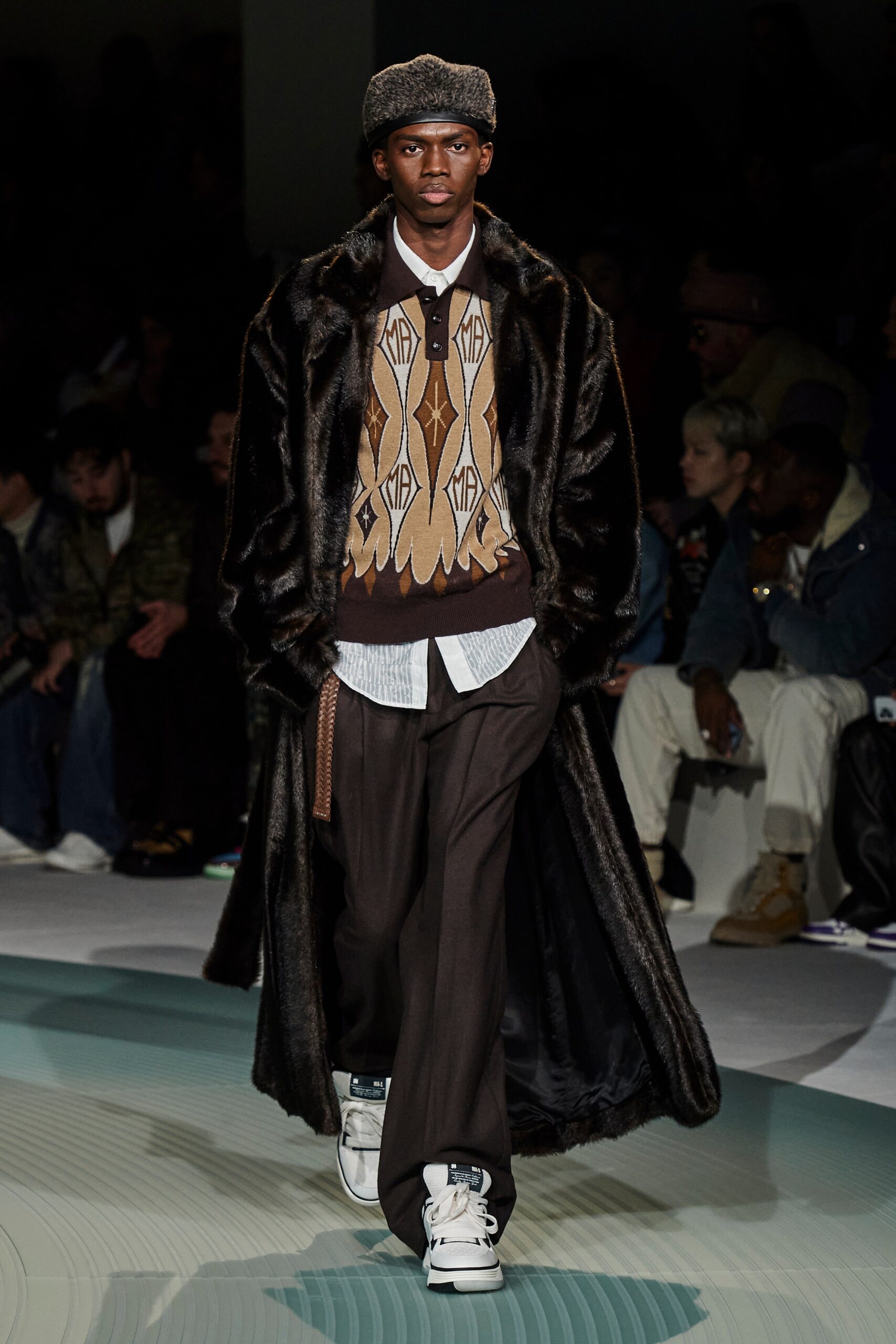 black faux-fur coat with sweater