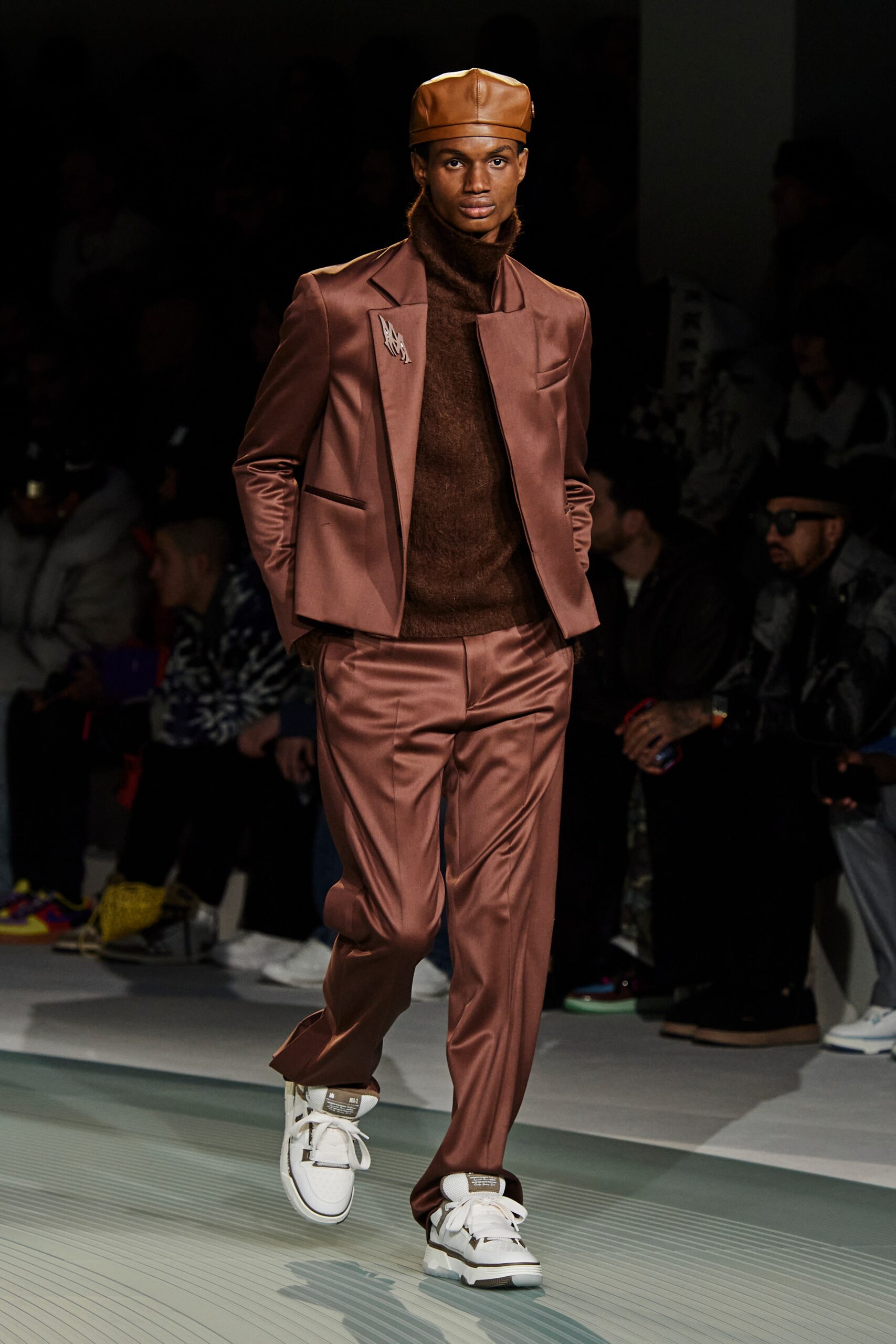 brown tailored suit with hat