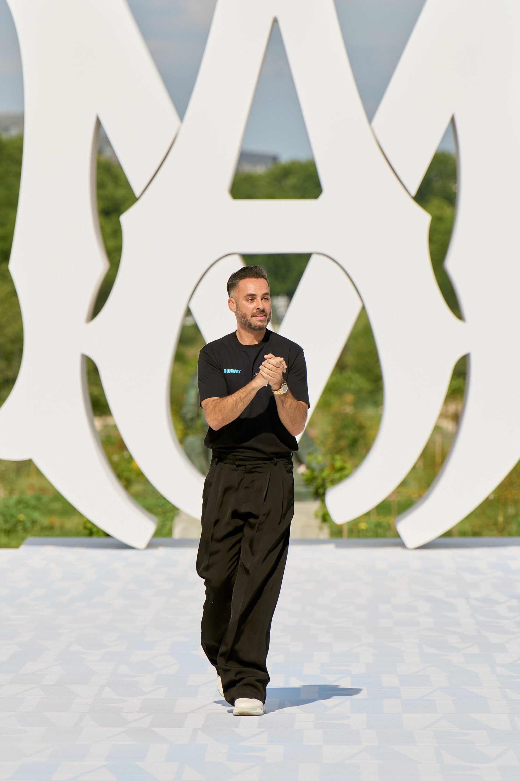 black fitted shirt and relaxed pants
